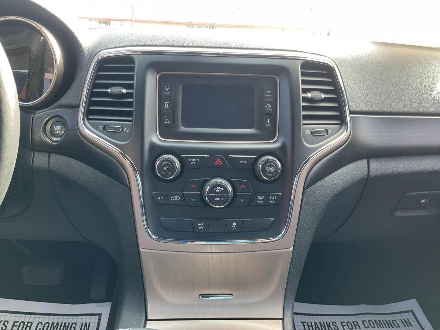2014 Jeep Grand Cherokee Laredo (1C4RJFAGXEC) with an 3.6L V-6 DOHC engine, located at 1951 S Dayton Lakeview Rd., New Carlisle, OH, 45344, (937) 908-9800, 39.890999, -84.050255 - 2014 Jeep Grand Cherokee Laredo - Photo#12