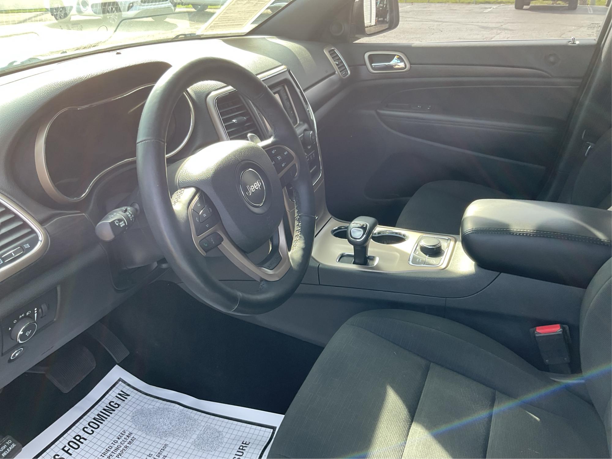 2014 Jeep Grand Cherokee Laredo (1C4RJFAGXEC) with an 3.6L V-6 DOHC engine, located at 1951 S Dayton Lakeview Rd., New Carlisle, OH, 45344, (937) 908-9800, 39.890999, -84.050255 - 2014 Jeep Grand Cherokee Laredo - Photo#8
