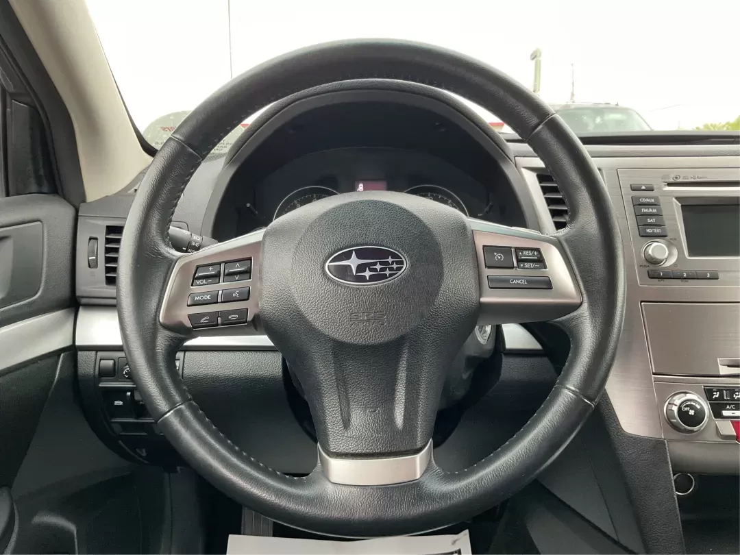 2014 Subaru Outback 2.5i Premium (4S4BRCDC0E3) with an 2.5L H-4 DOHC engine, located at 8750 N County Rd 25A, Piqua, OH, 45356, (937) 908-9800, 40.164391, -84.232513 - 2014 Subaru Outback 2.5i Premium - Photo#15