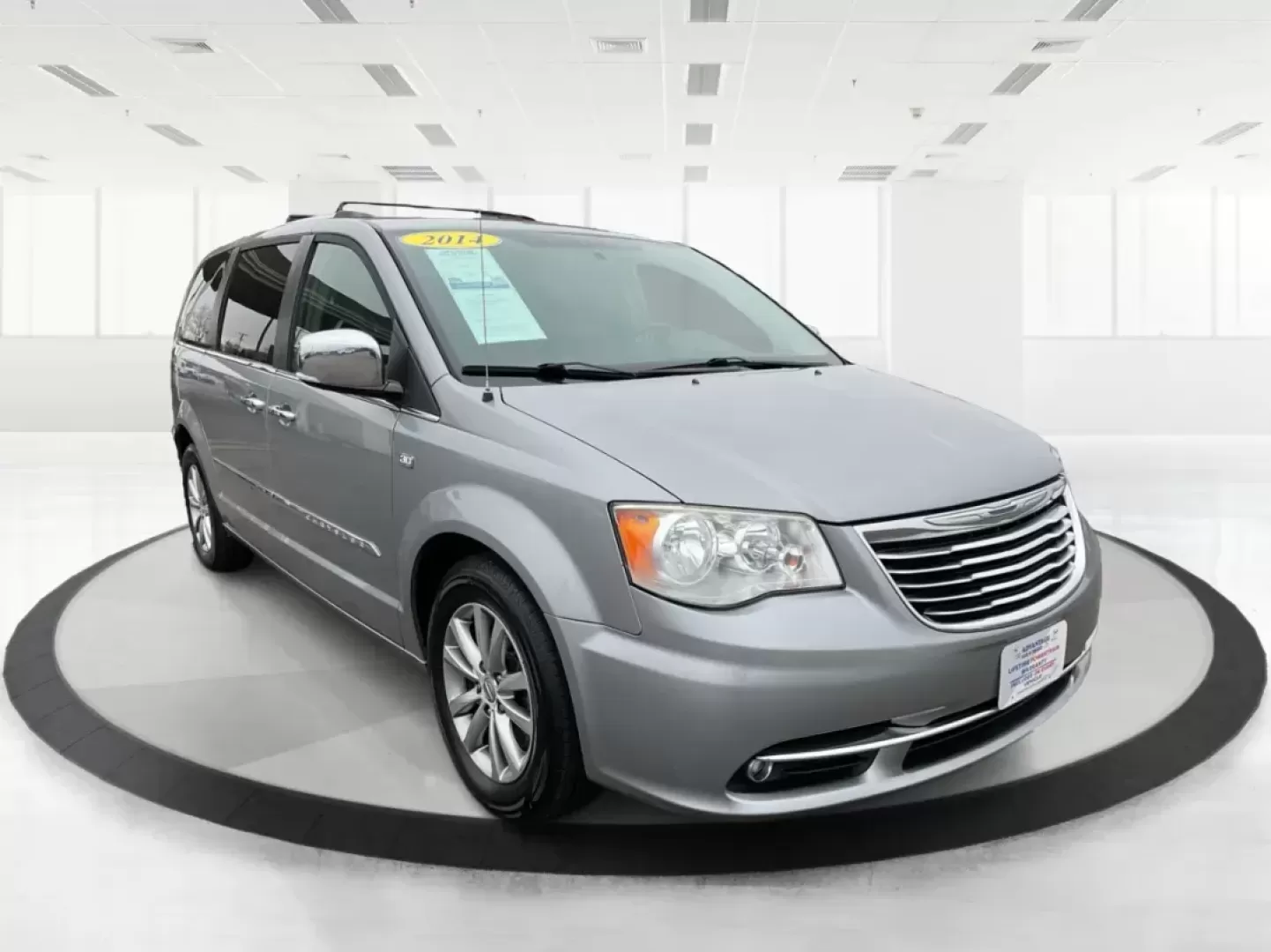2014 Chrysler Town and Country Touring-L 30th Anniversary (2C4RC1CG7ER) with an Pentastar 3.6L V-6 DOHC engine, located at 1184 Kauffman Ave, Fairborn, OH, 45324, (937) 908-9800, 39.807072, -84.030914 - Photo#0