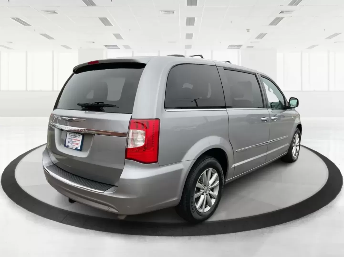 2014 Chrysler Town and Country Touring-L 30th Anniversary (2C4RC1CG7ER) with an Pentastar 3.6L V-6 DOHC engine, located at 1184 Kauffman Ave, Fairborn, OH, 45324, (937) 908-9800, 39.807072, -84.030914 - Photo#2