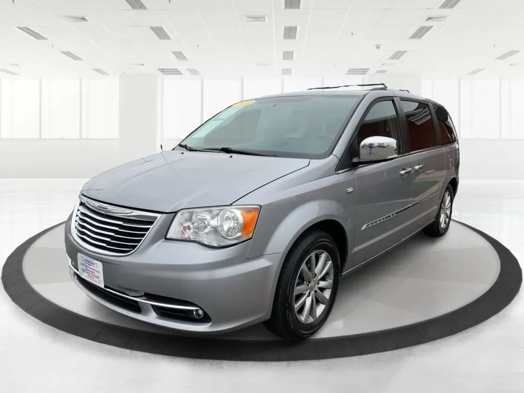 2014 Chrysler Town and Country Touring-L 30th Anniversary (2C4RC1CG7ER) with an Pentastar 3.6L V-6 DOHC engine, located at 1184 Kauffman Ave, Fairborn, OH, 45324, (937) 908-9800, 39.807072, -84.030914 - 2014 Chrysler Town and Country Touring-L 30th Anniversary - Photo#7