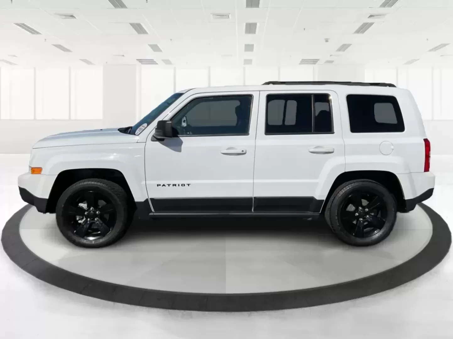 2015 Jeep Patriot Altitude Edition (1C4NJPBA1FD) with an 2L I-4 DOHC engine, located at 401 Woodman Dr, Riverside, OH, 45431, (937) 908-9800, 39.760899, -84.123421 - Photo#3