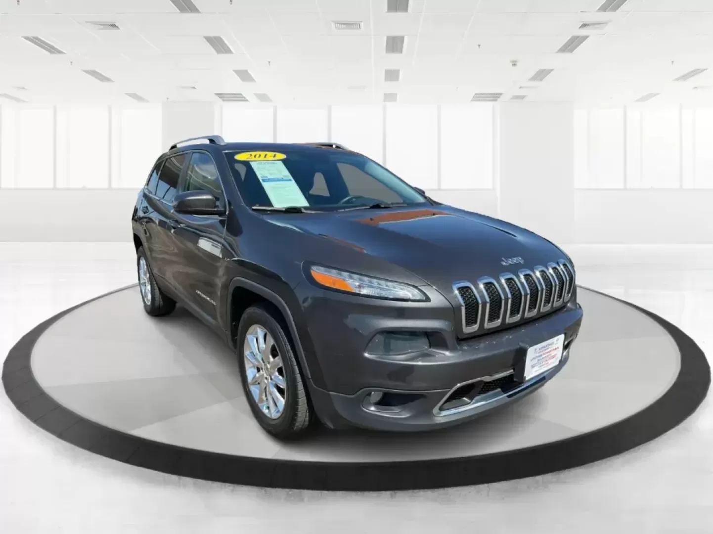 2014 Jeep Cherokee Limited 4WD (1C4PJMDBXEW) with an 2.4L L4 DOHC 16V engine, 9-Speed Automatic transmission, located at 880 E. National Road, Vandalia, OH, 45377, (937) 908-9800, 39.891918, -84.183594 - Photo#0