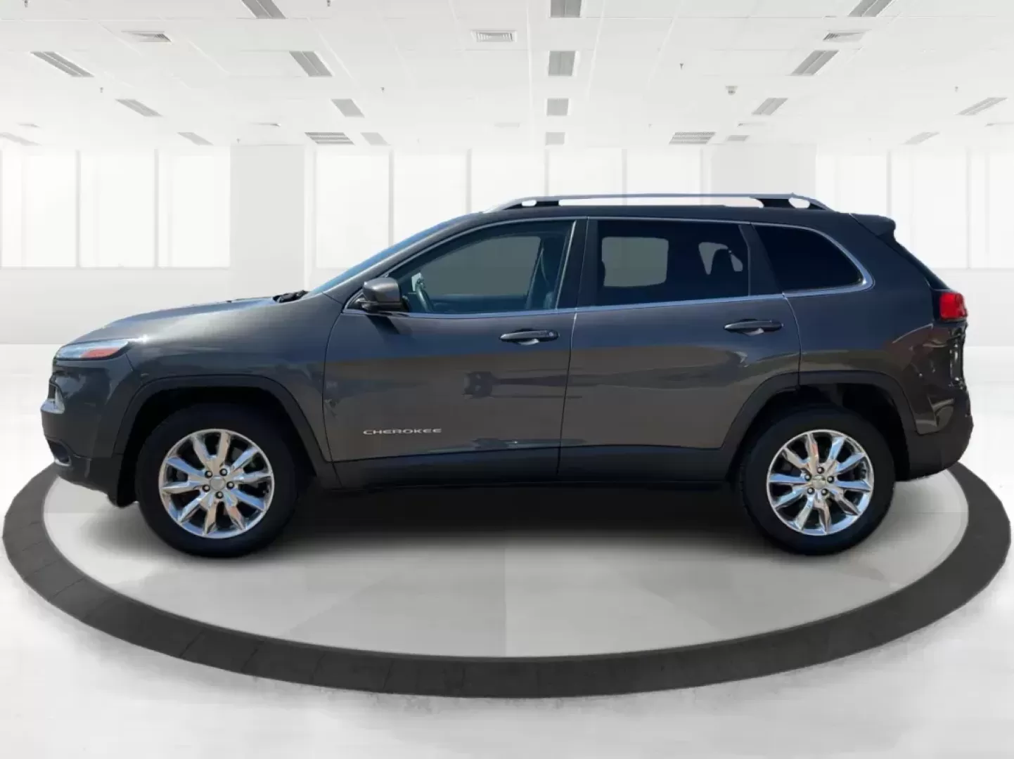 2014 Jeep Cherokee Limited 4WD (1C4PJMDBXEW) with an 2.4L L4 DOHC 16V engine, 9-Speed Automatic transmission, located at 880 E. National Road, Vandalia, OH, 45377, (937) 908-9800, 39.891918, -84.183594 - Photo#5