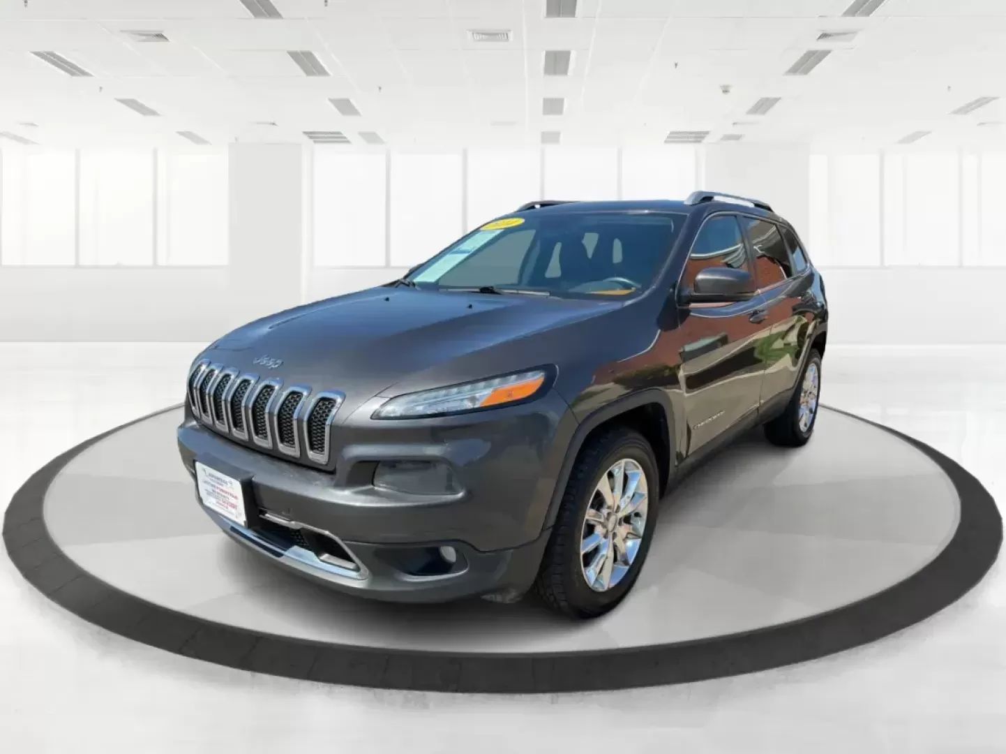 2014 Jeep Cherokee Limited 4WD (1C4PJMDBXEW) with an 2.4L L4 DOHC 16V engine, 9-Speed Automatic transmission, located at 880 E. National Road, Vandalia, OH, 45377, (937) 908-9800, 39.891918, -84.183594 - Photo#7