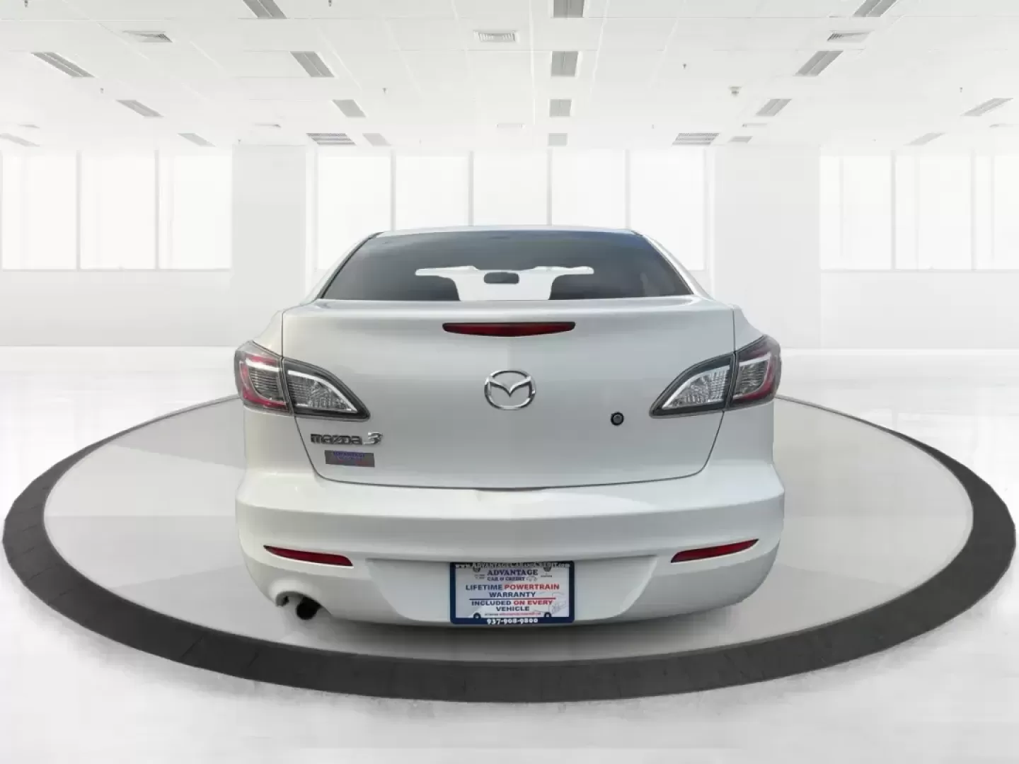2013 Mazda Mazda3 i SV (JM1BL1TF0D1) with an 2L I-4 DOHC engine, located at 1184 Kauffman Ave, Fairborn, OH, 45324, (937) 908-9800, 39.807072, -84.030914 - 2013 Mazda Mazda3 i SV - Photo#4
