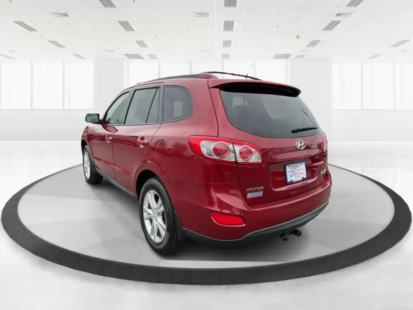 2011 Hyundai Santa Fe SE (5XYZHDAG5BG) with an 3.5L V-6 DOHC engine, located at 1184 Kauffman Ave, Fairborn, OH, 45324, (937) 908-9800, 39.807072, -84.030914 - Photo#4