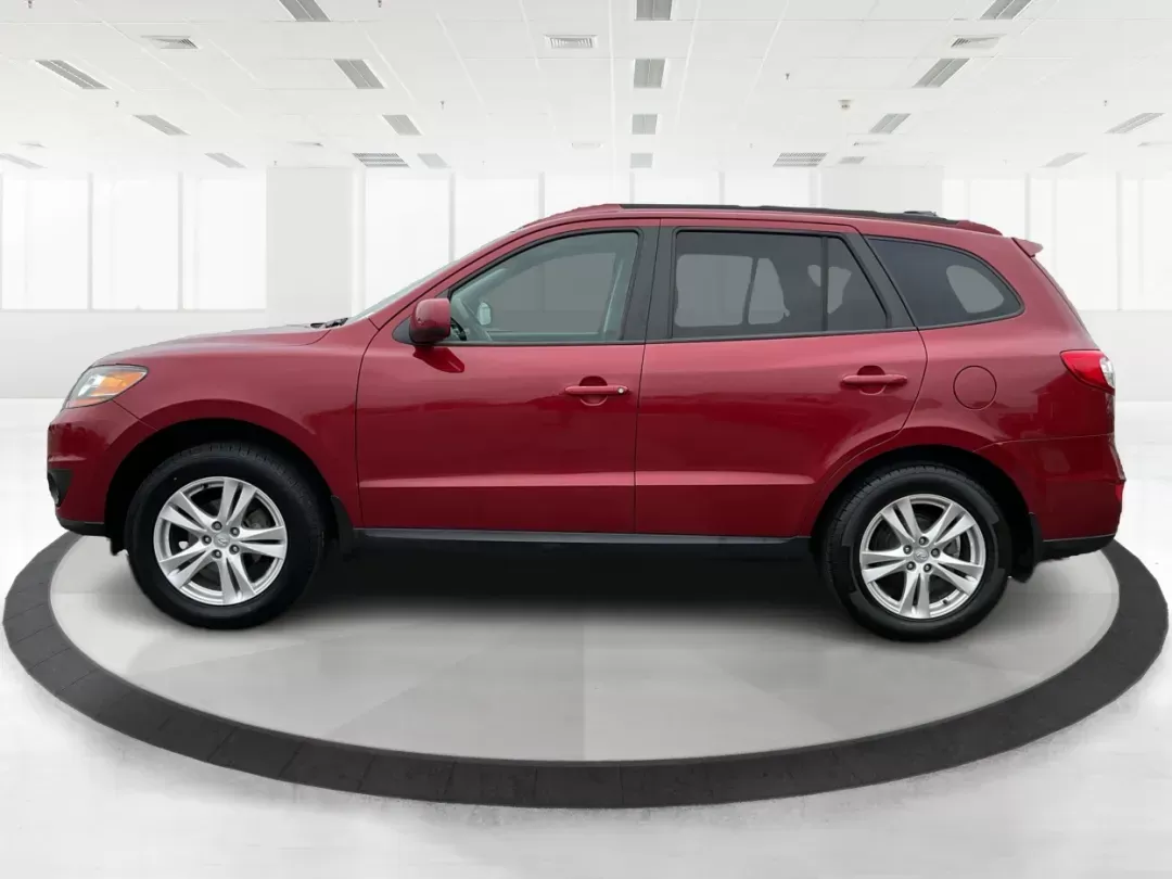 2011 Hyundai Santa Fe SE (5XYZHDAG5BG) with an 3.5L V-6 DOHC engine, located at 1184 Kauffman Ave, Fairborn, OH, 45324, (937) 908-9800, 39.807072, -84.030914 - 2011 Hyundai Santa Fe SE - Photo#5