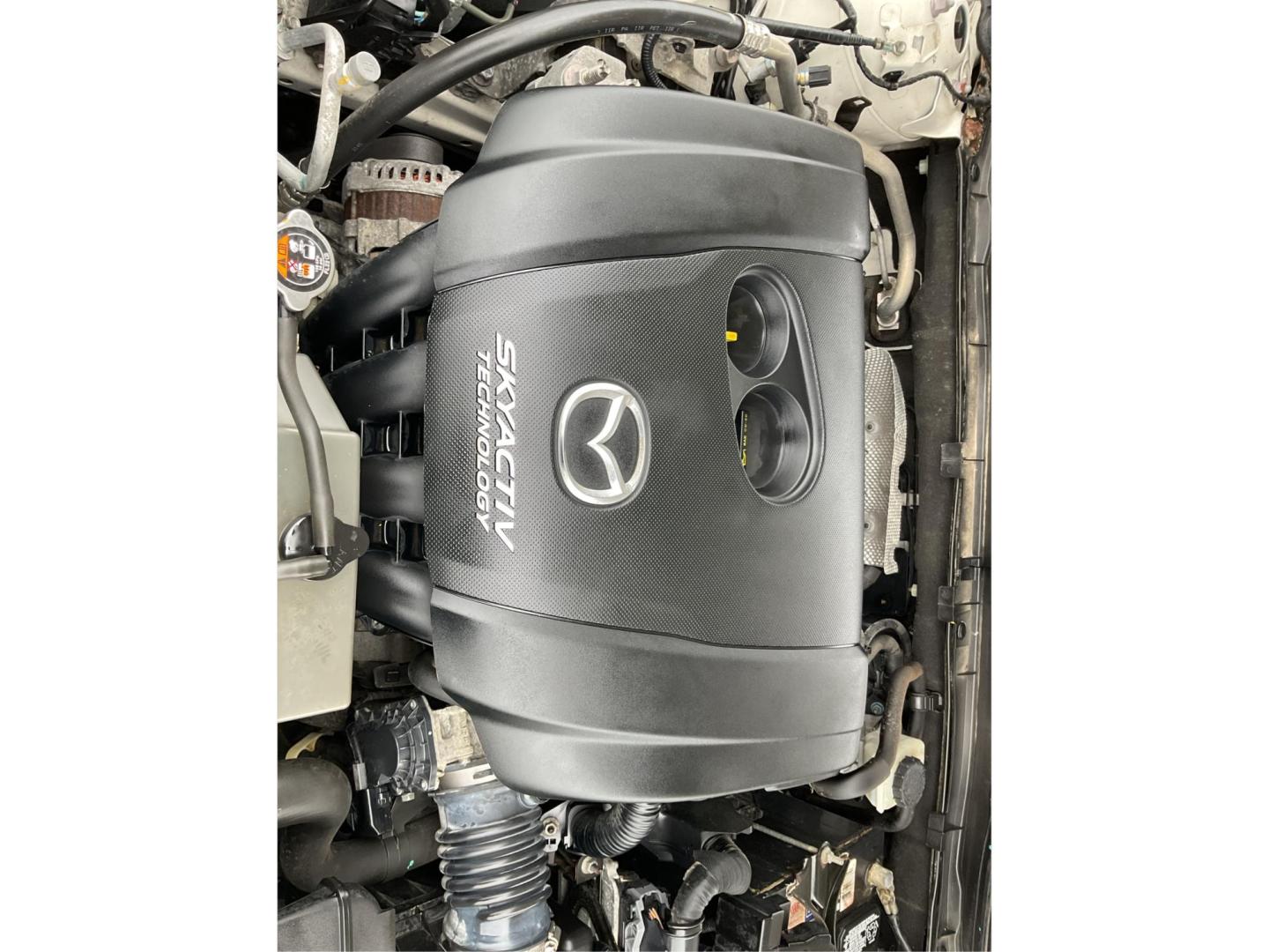 2016 Mazda Mazda3 i Sport (3MZBM1T74GM) with an SKYACTIV-G 2L I-4 gasoline direct injection engine, located at 1230 East Main St, Xenia, OH, 45385, (937) 908-9800, 39.688026, -83.910172 - Photo#10
