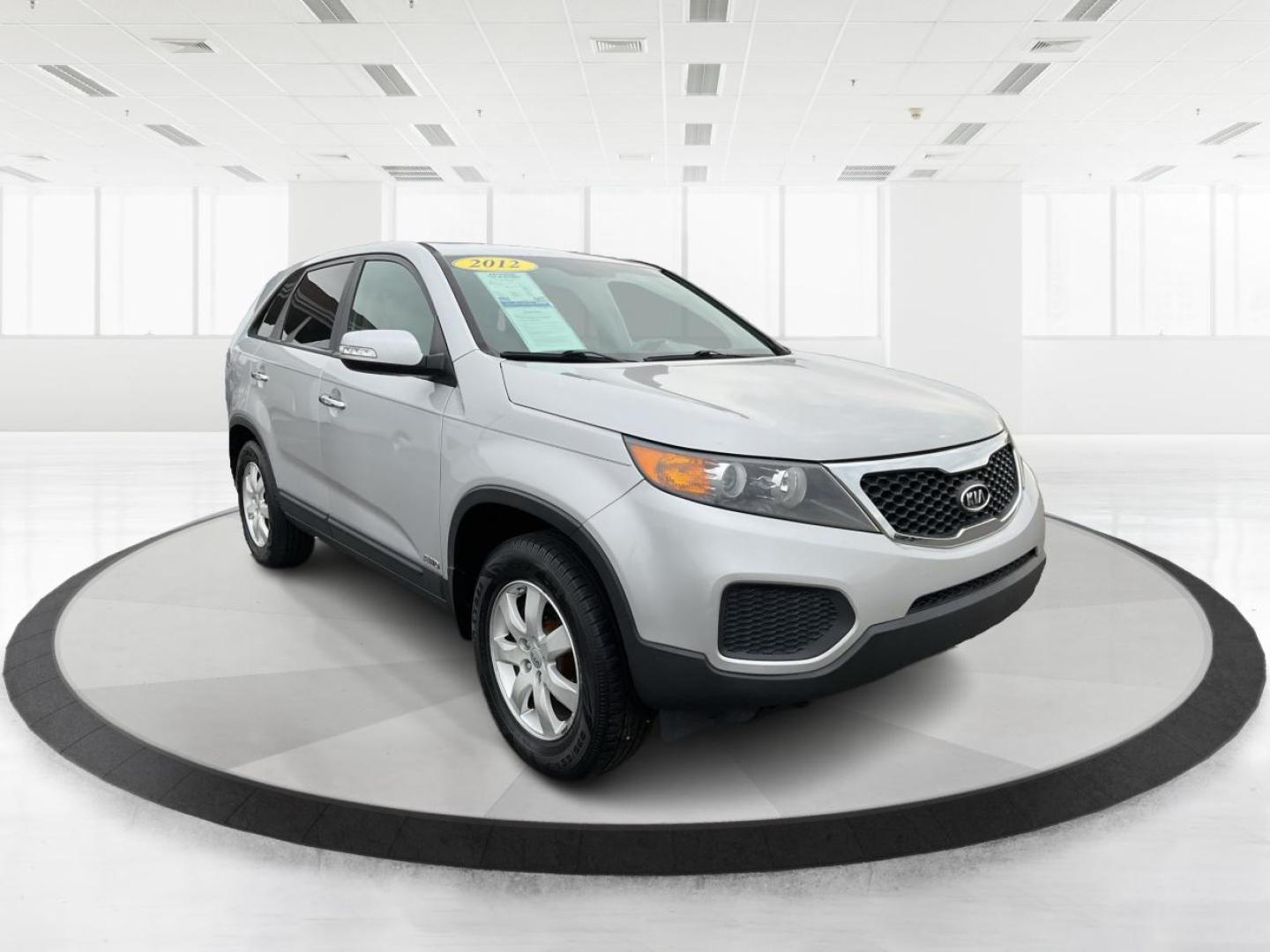 2012 Kia Sorento LX (5XYKTCA68CG) with an 2.4L I-4 gasoline direct injection engine, located at 4508 South Dixie Dr, Moraine, OH, 45439, (937) 908-9800, 39.689976, -84.218452 - Photo#0
