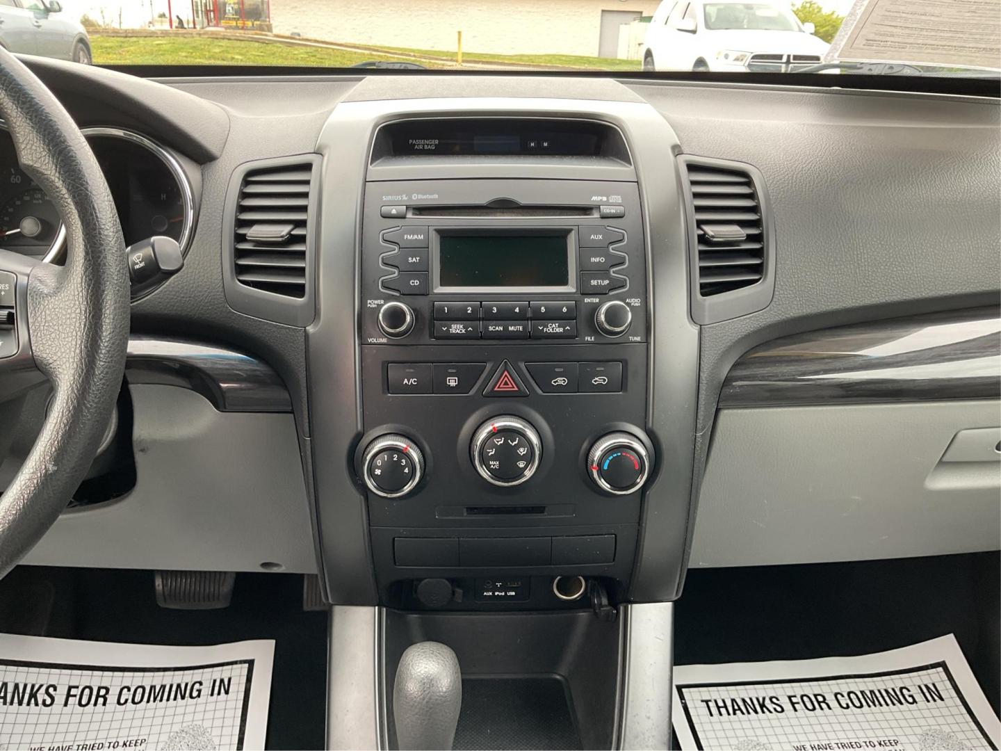 2012 Kia Sorento LX (5XYKTCA68CG) with an 2.4L I-4 gasoline direct injection engine, located at 4508 South Dixie Dr, Moraine, OH, 45439, (937) 908-9800, 39.689976, -84.218452 - Photo#12