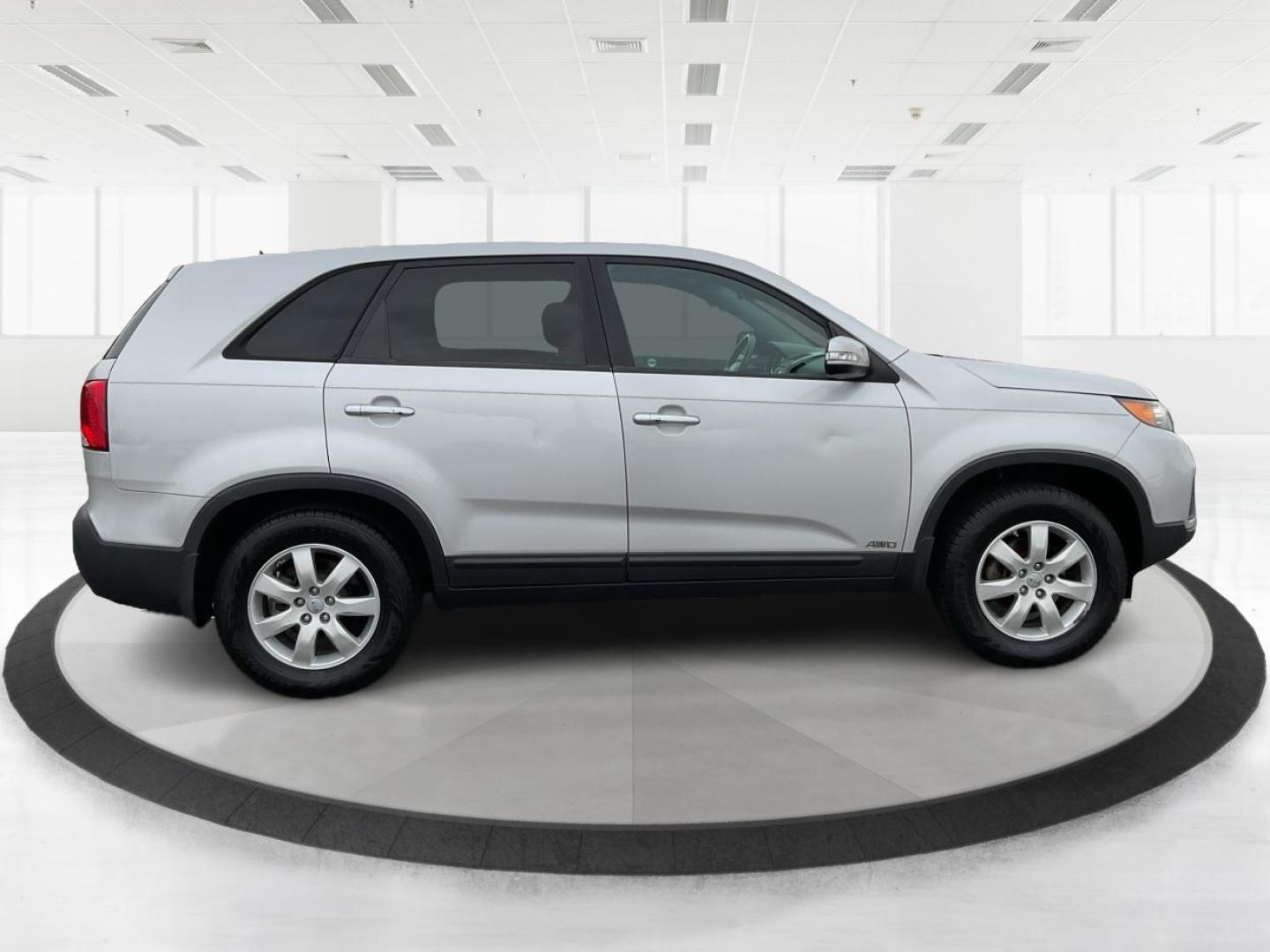 2012 Kia Sorento LX (5XYKTCA68CG) with an 2.4L I-4 gasoline direct injection engine, located at 4508 South Dixie Dr, Moraine, OH, 45439, (937) 908-9800, 39.689976, -84.218452 - Photo#1
