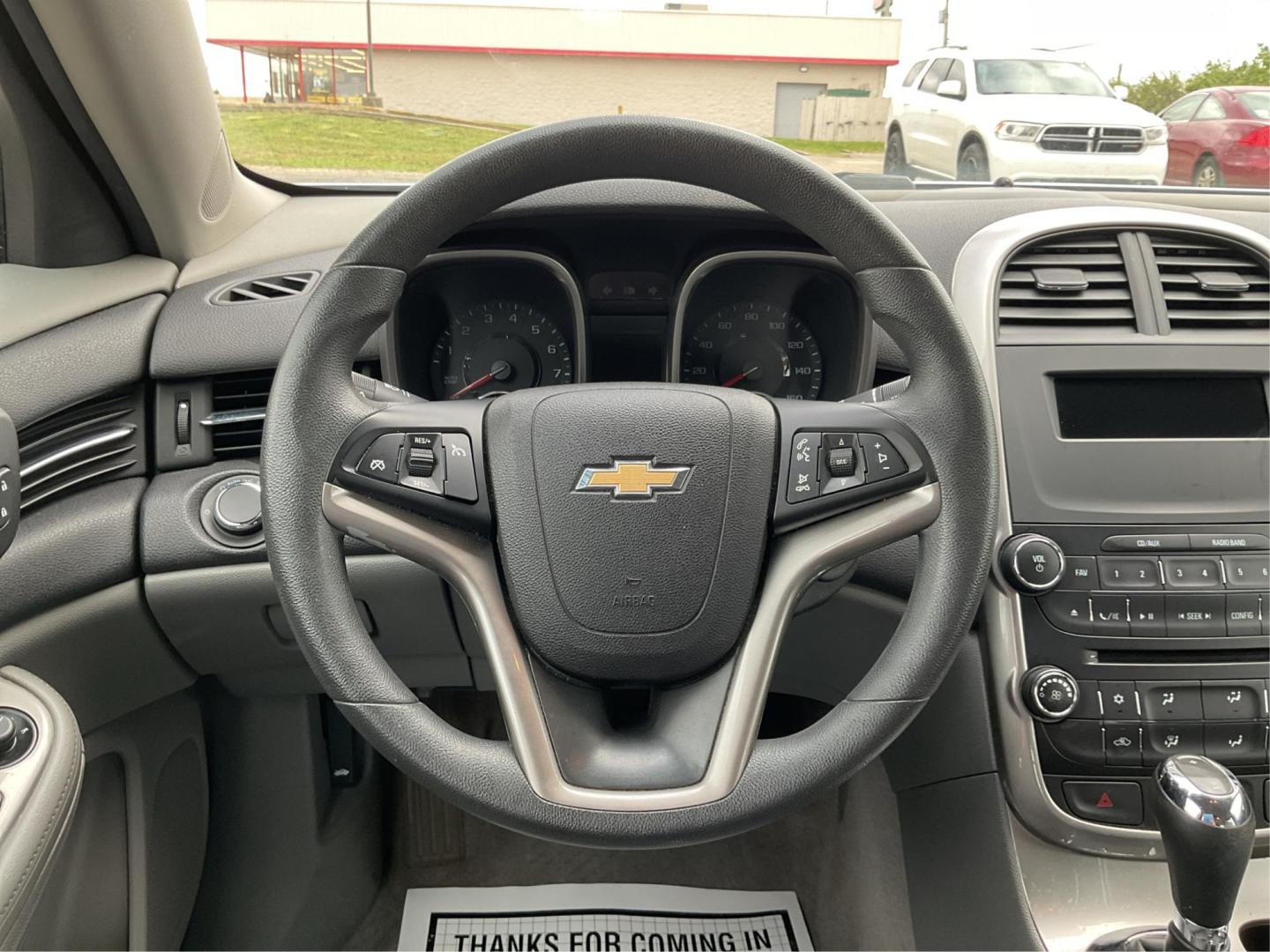 2014 Chevrolet Malibu 1LS (1G11B5SL5EU) with an ECOTEC 2.5L I-4 gasoline direct injection engine, located at 4508 South Dixie Dr, Moraine, OH, 45439, (937) 908-9800, 39.689976, -84.218452 - Photo#12