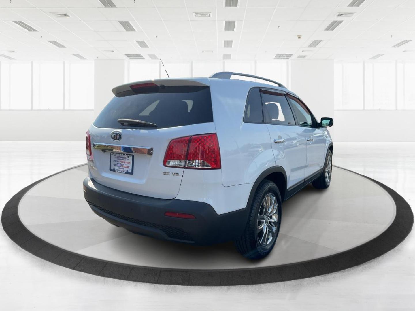 2011 Kia Sorento EX V6 (5XYKUDA22BG) with an 3.5L V-6 DOHC engine, located at 1184 Kauffman Ave, Fairborn, OH, 45324, (937) 908-9800, 39.807072, -84.030914 - Photo#2