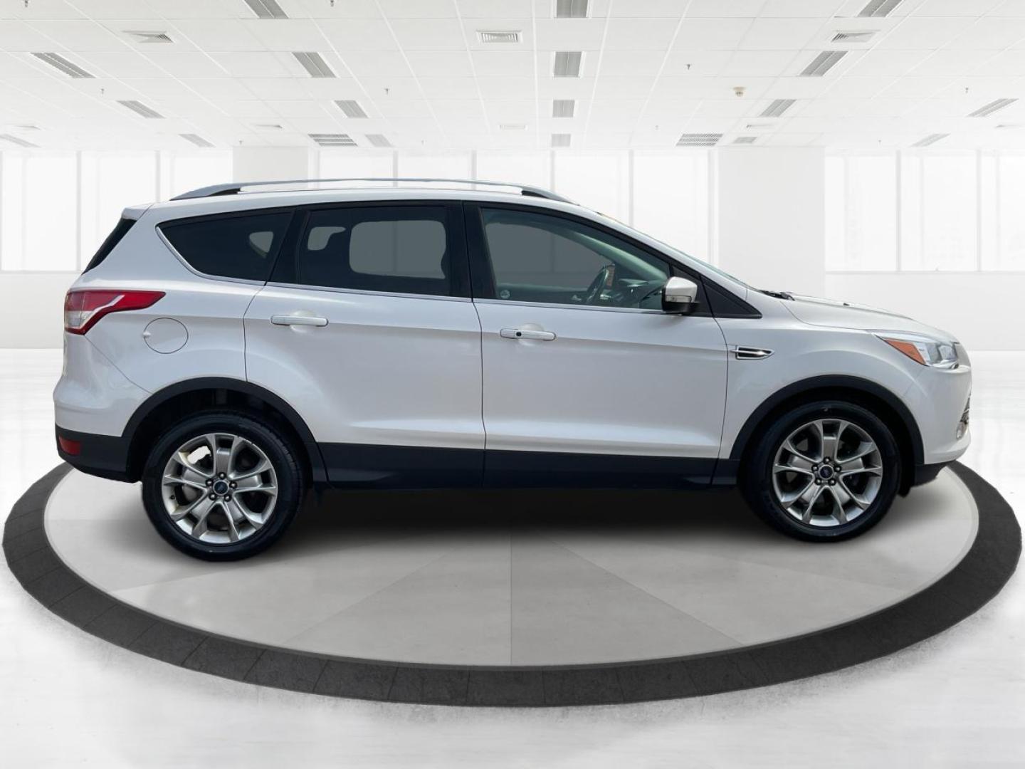 2016 Ford Escape Titanium (1FMCU9J98GU) with an Other engine, located at 1230 East Main St, Xenia, OH, 45385, (937) 908-9800, 39.688026, -83.910172 - Photo#1