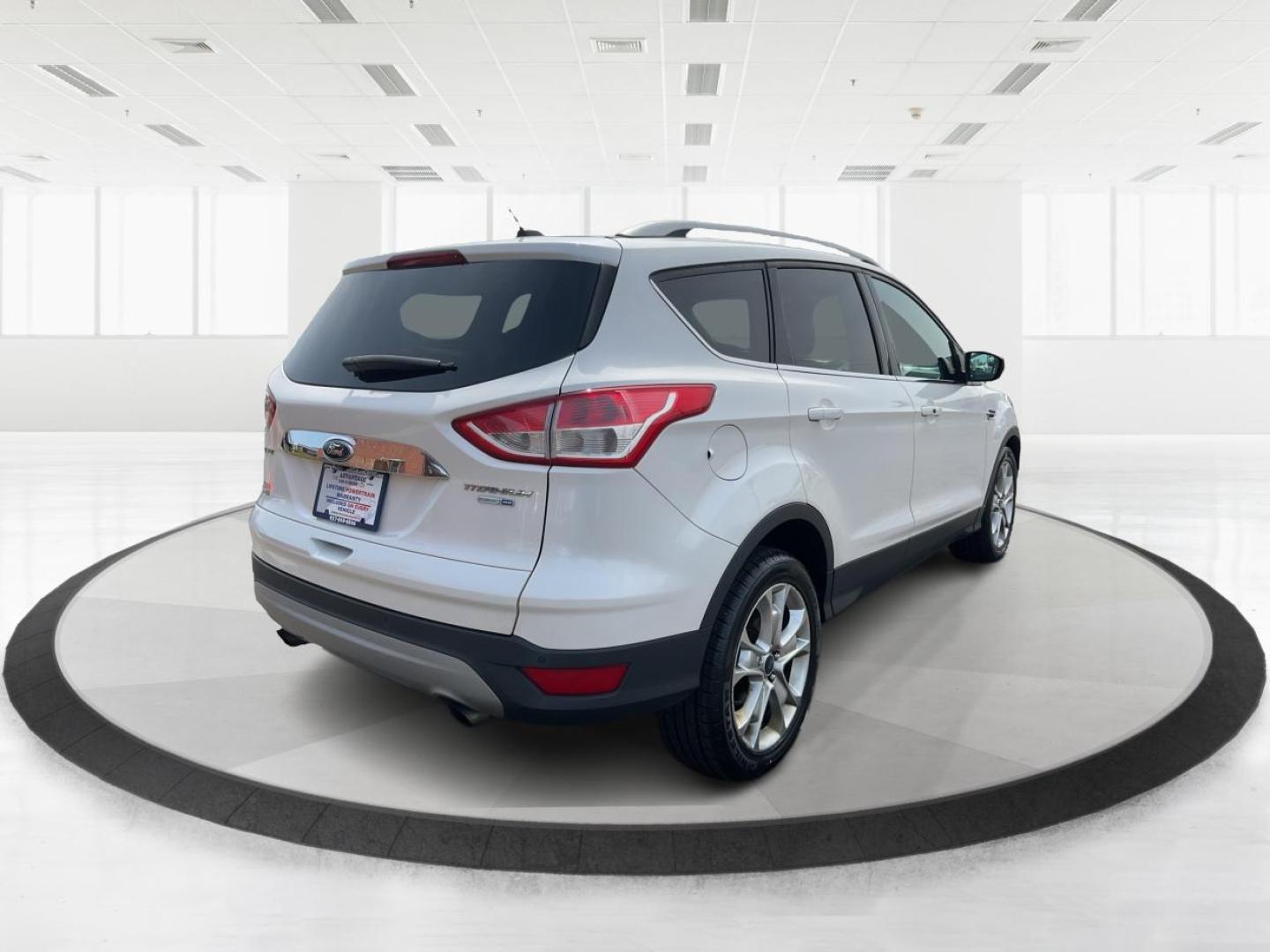 2016 Ford Escape Titanium (1FMCU9J98GU) with an Other engine, located at 1230 East Main St, Xenia, OH, 45385, (937) 908-9800, 39.688026, -83.910172 - Photo#2