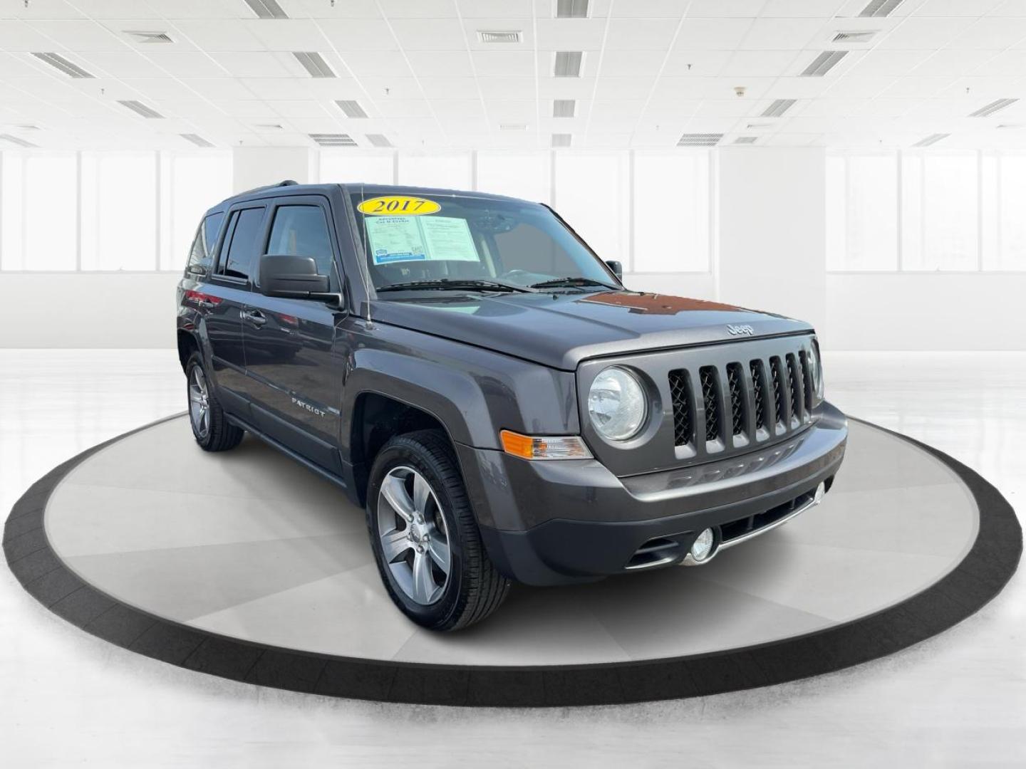 2017 Jeep Patriot High Altitude 4x4 (1C4NJRFB8HD) with an 2.4L I-4 DOHC engine, located at 880 E. National Road, Vandalia, OH, 45377, (937) 908-9800, 39.891918, -84.183594 - Photo#0