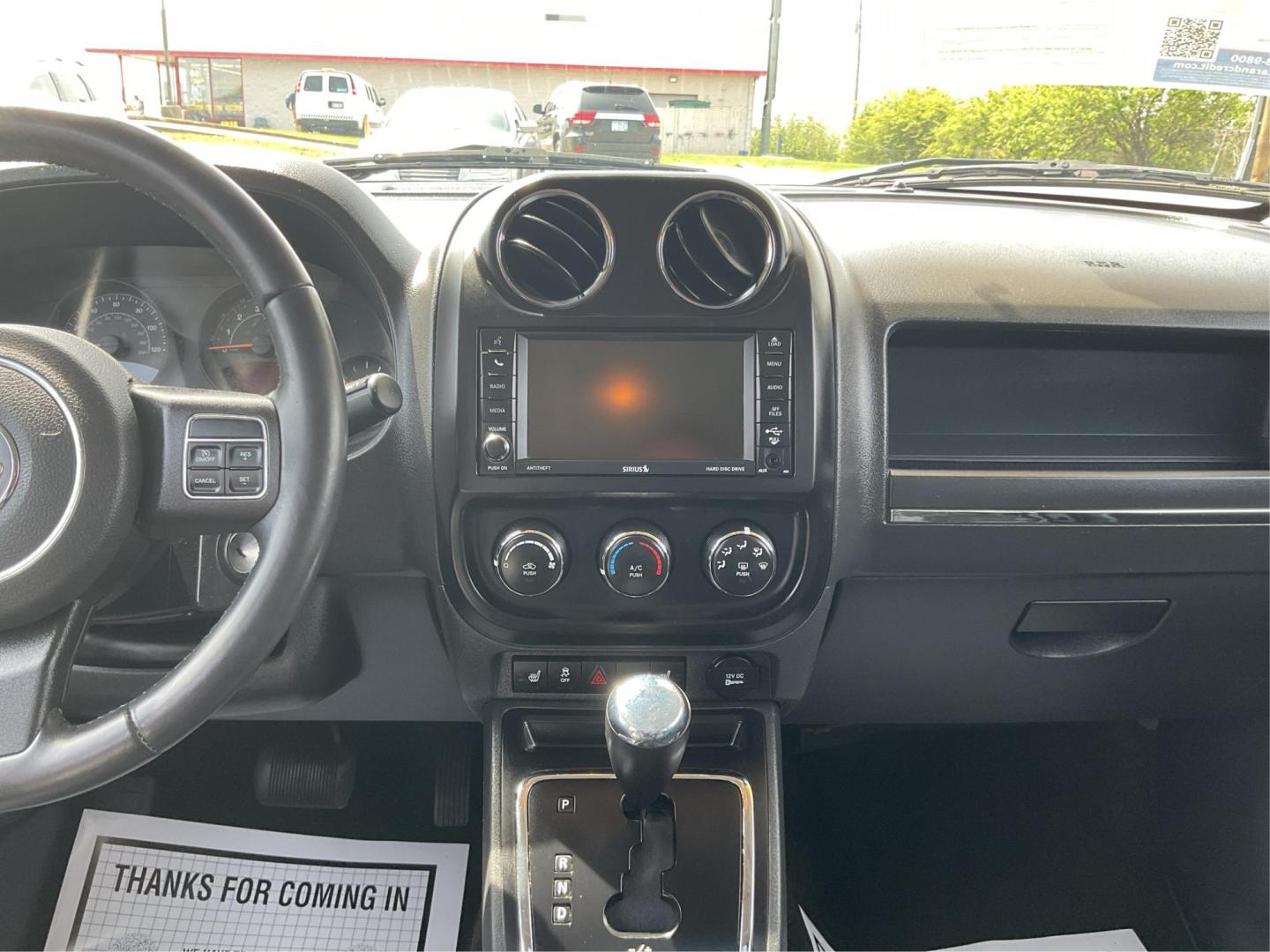 2017 Jeep Patriot High Altitude 4x4 (1C4NJRFB8HD) with an 2.4L I-4 DOHC engine, located at 880 E. National Road, Vandalia, OH, 45377, (937) 908-9800, 39.891918, -84.183594 - Photo#12