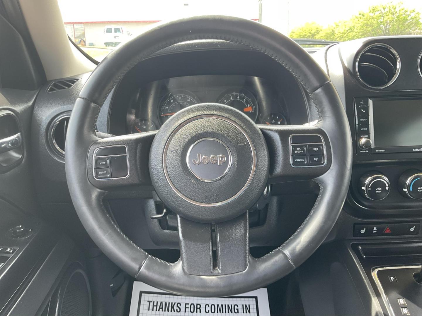 2017 Jeep Patriot High Altitude 4x4 (1C4NJRFB8HD) with an 2.4L I-4 DOHC engine, located at 880 E. National Road, Vandalia, OH, 45377, (937) 908-9800, 39.891918, -84.183594 - Photo#15
