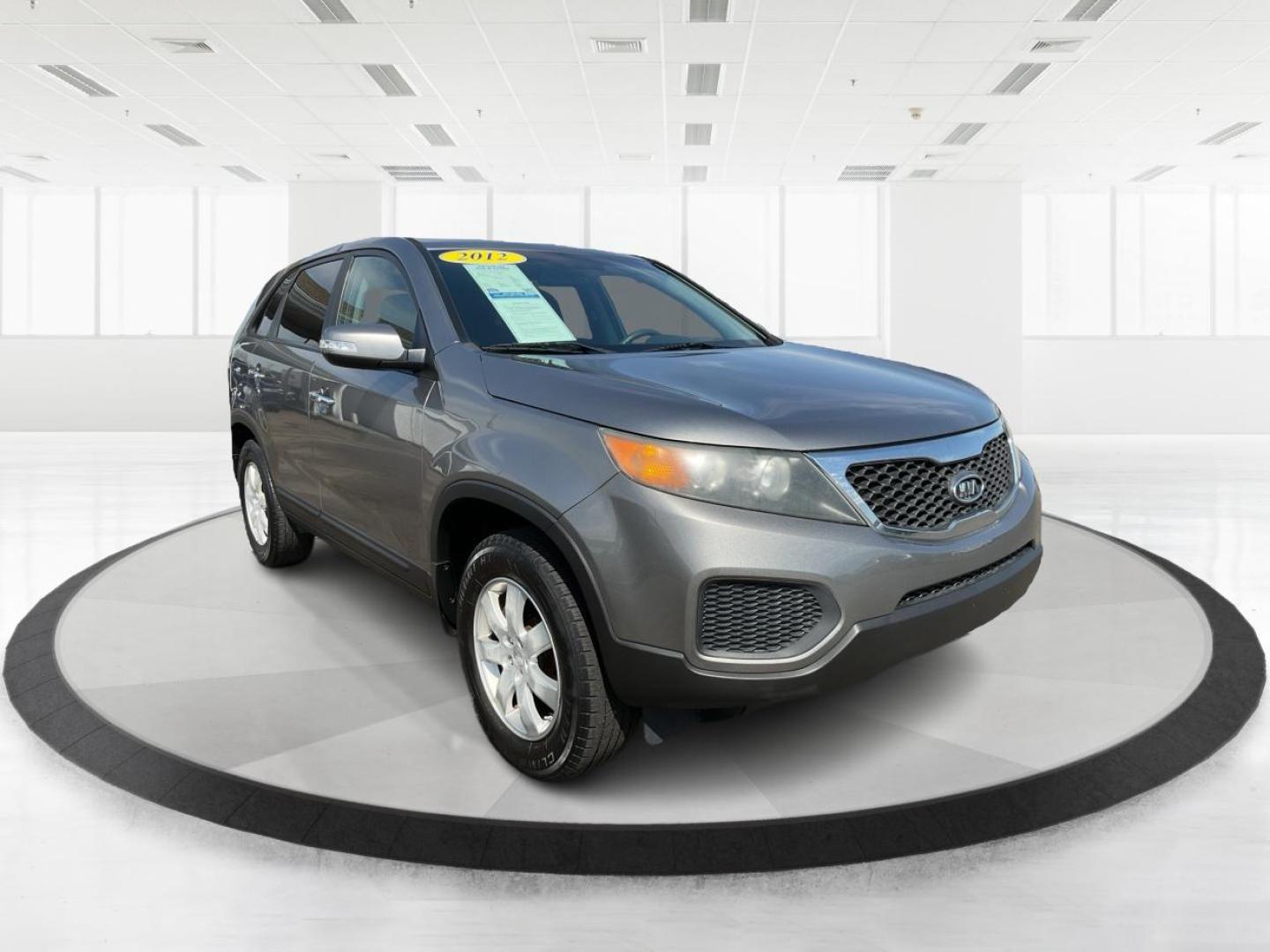 2012 Kia Sorento LX (5XYKT3A17CG) with an 2.4L I-4 DOHC engine, located at 401 Woodman Dr, Riverside, OH, 45431, (937) 908-9800, 39.760899, -84.123421 - Photo#0