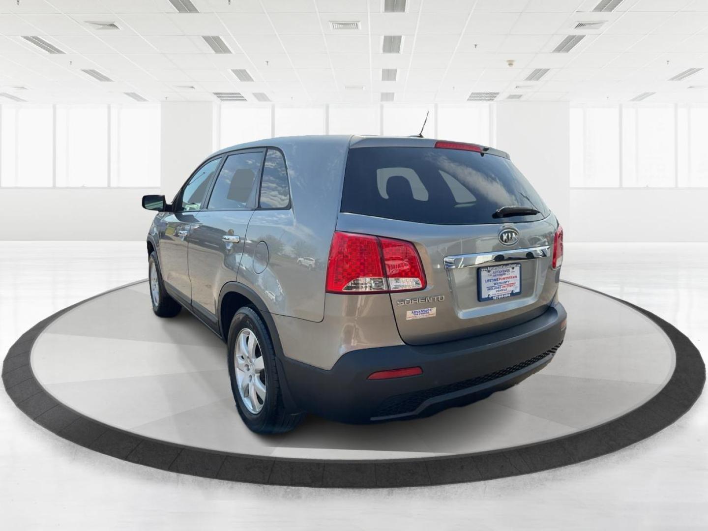 2012 Kia Sorento LX (5XYKT3A17CG) with an 2.4L I-4 DOHC engine, located at 401 Woodman Dr, Riverside, OH, 45431, (937) 908-9800, 39.760899, -84.123421 - Photo#4