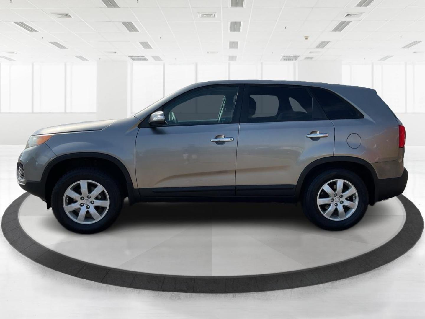 2012 Kia Sorento LX (5XYKT3A17CG) with an 2.4L I-4 DOHC engine, located at 401 Woodman Dr, Riverside, OH, 45431, (937) 908-9800, 39.760899, -84.123421 - Photo#5