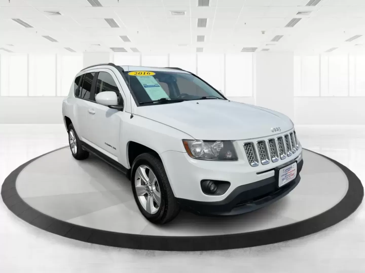 2016 Jeep Compass Latitude (1C4NJDEB9GD) with an 2.4L I-4 DOHC engine, located at 401 Woodman Dr, Riverside, OH, 45431, (937) 908-9800, 39.760899, -84.123421 - 2016 Jeep Compass Latitude - Photo#0