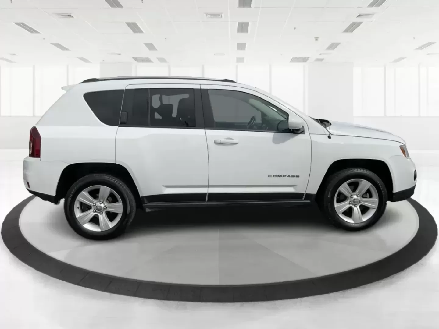 2016 Jeep Compass Latitude (1C4NJDEB9GD) with an 2.4L I-4 DOHC engine, located at 401 Woodman Dr, Riverside, OH, 45431, (937) 908-9800, 39.760899, -84.123421 - 2016 Jeep Compass Latitude - Photo#1