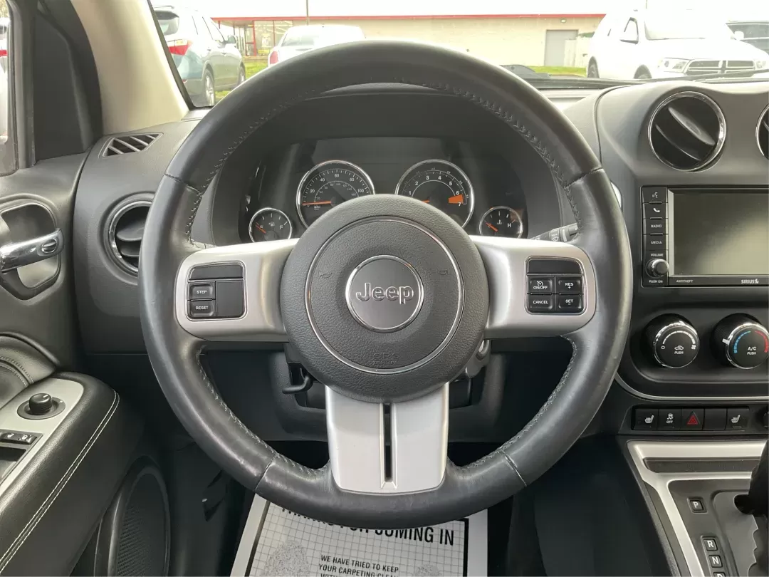 2016 Jeep Compass Latitude (1C4NJDEB9GD) with an 2.4L I-4 DOHC engine, located at 401 Woodman Dr, Riverside, OH, 45431, (937) 908-9800, 39.760899, -84.123421 - 2016 Jeep Compass Latitude - Photo#13