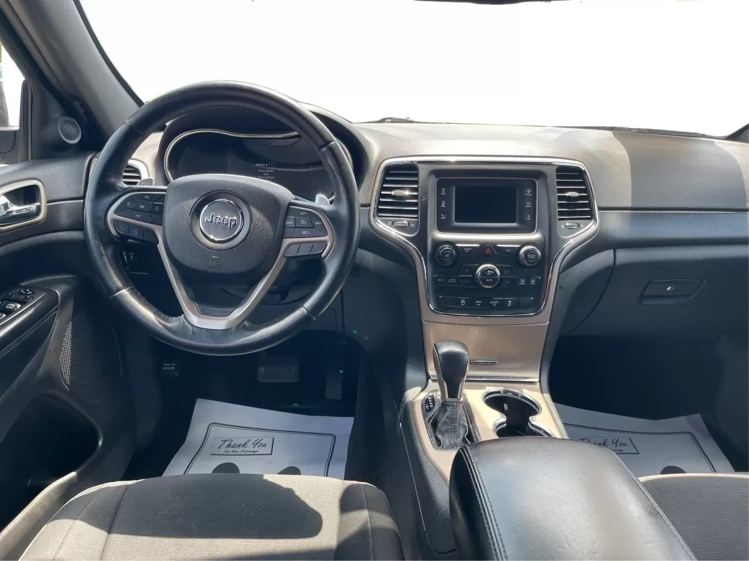 2016 Jeep Grand Cherokee Laredo (1C4RJFAG8GC) with an Pentastar 3.6L V-6 DOHC engine, located at 880 E. National Road, Vandalia, OH, 45377, (937) 908-9800, 39.891918, -84.183594 - Photo#21