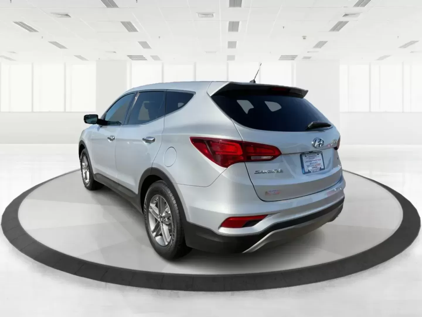 2018 Hyundai Santa Fe Sport 2.4L (5XYZT3LB2JG) with an Theta II 2.4L I-4 gasoline direct injection engine, located at 8750 N County Rd 25A, Piqua, OH, 45356, (937) 908-9800, 40.164391, -84.232513 - 2018 Hyundai Santa Fe Sport 2.4L - Photo#4