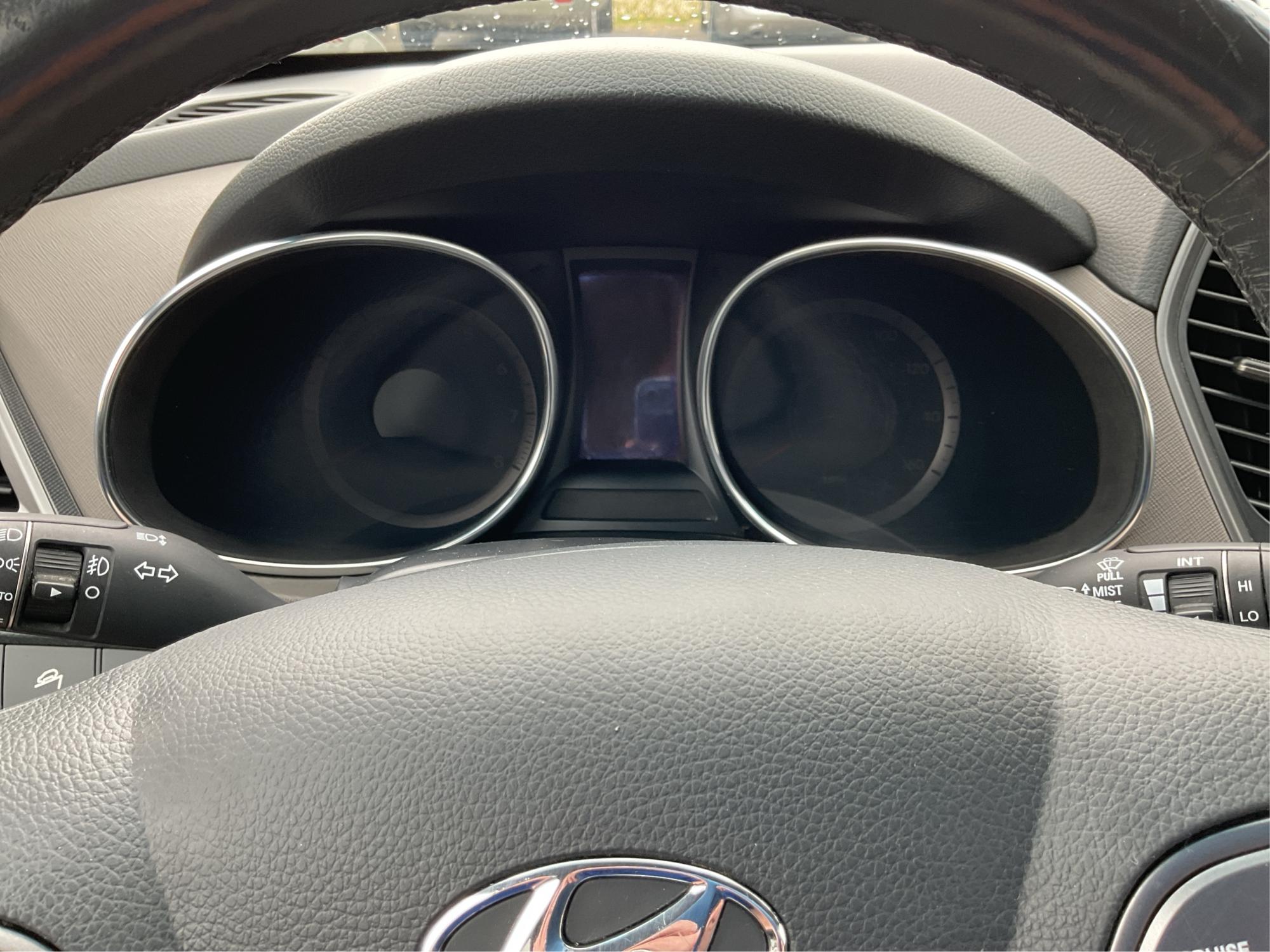2013 Hyundai Santa Fe Sport (5XYZU3LB9DG) with an Theta II 2.4L I-4 gasoline direct injection engine, located at 880 E. National Road, Vandalia, OH, 45377, (937) 908-9800, 39.891918, -84.183594 - Photo#13