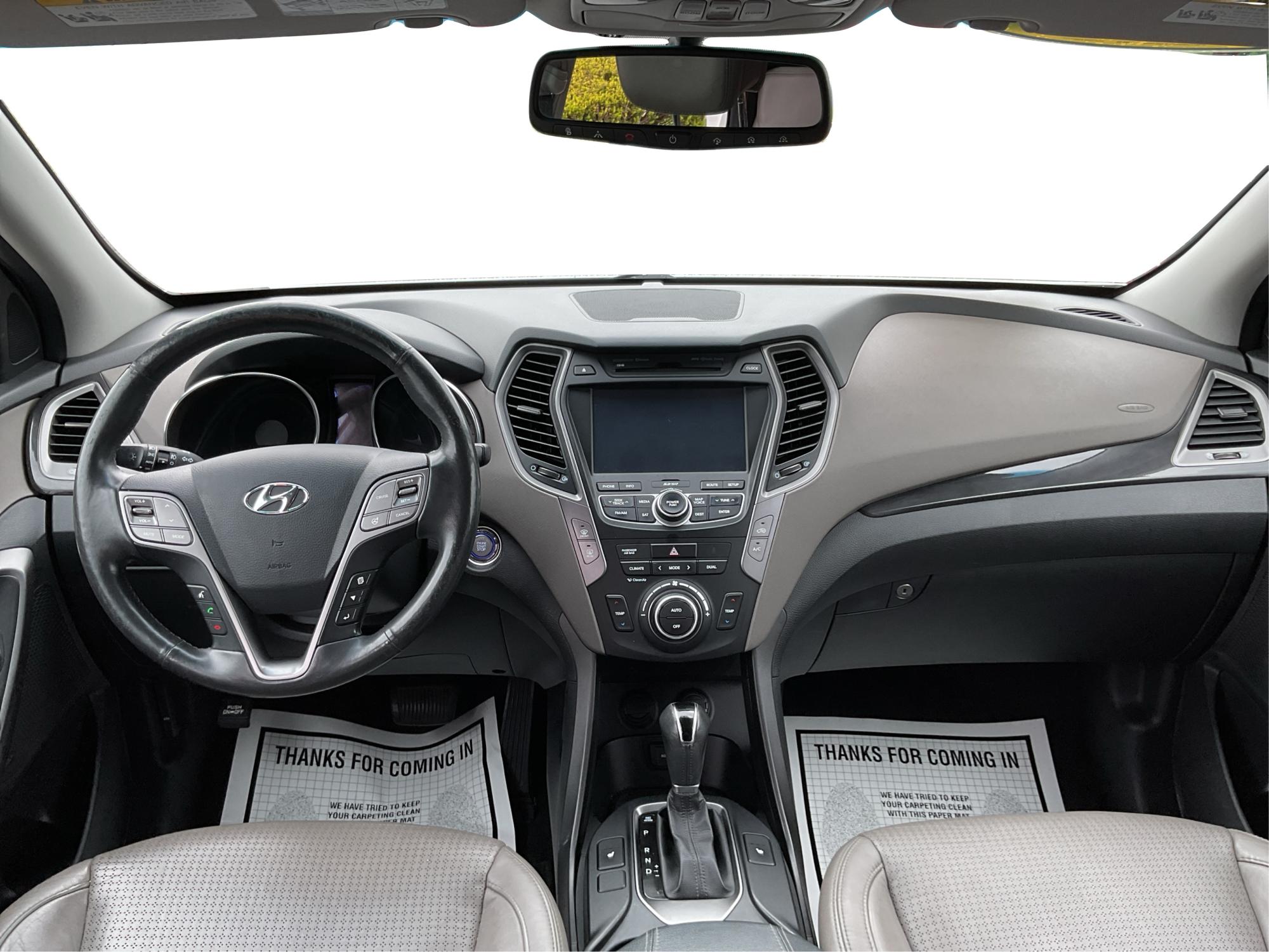 2013 Hyundai Santa Fe Sport (5XYZU3LB9DG) with an Theta II 2.4L I-4 gasoline direct injection engine, located at 880 E. National Road, Vandalia, OH, 45377, (937) 908-9800, 39.891918, -84.183594 - Photo#18