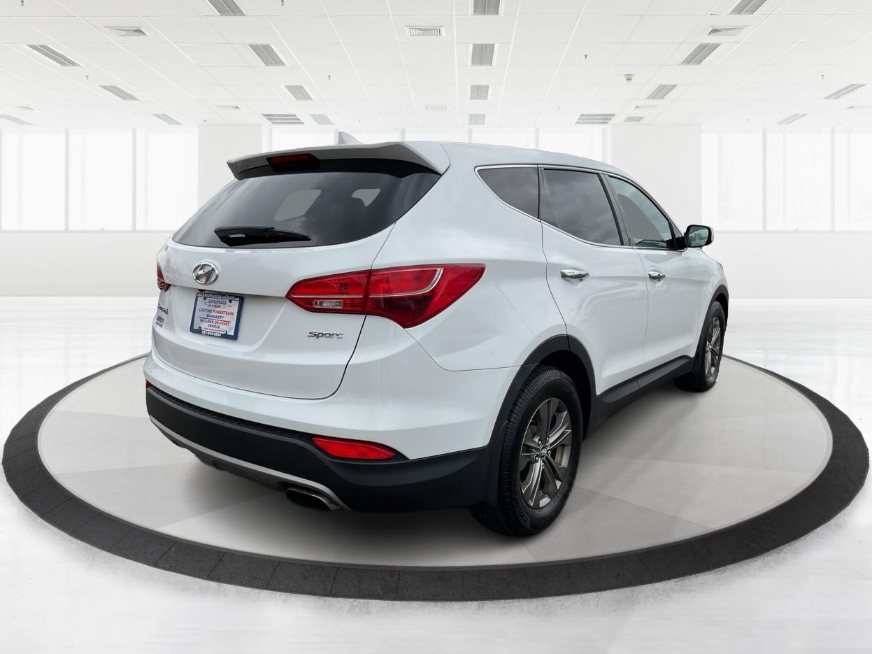 2013 Hyundai Santa Fe Sport (5XYZU3LB9DG) with an Theta II 2.4L I-4 gasoline direct injection engine, located at 880 E. National Road, Vandalia, OH, 45377, (937) 908-9800, 39.891918, -84.183594 - Photo#2