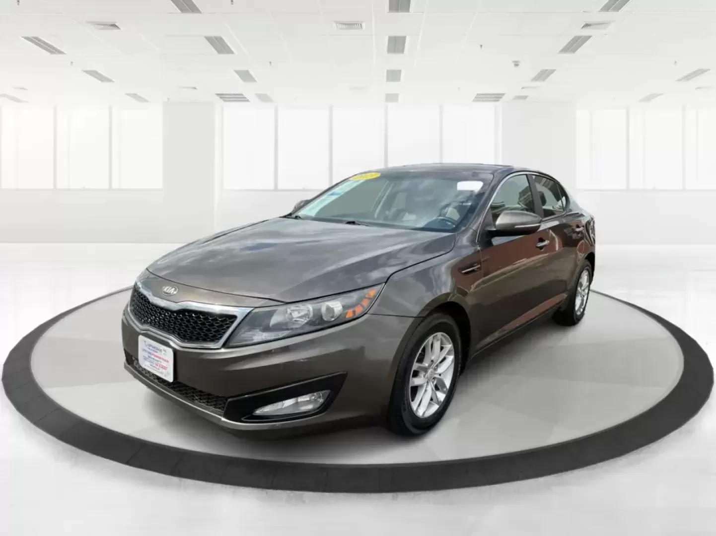 2013 Kia Optima LX (5XXGM4A71DG) with an 2.4L I-4 gasoline direct injection engine, located at 880 E. National Road, Vandalia, OH, 45377, (937) 908-9800, 39.891918, -84.183594 - Photo#7