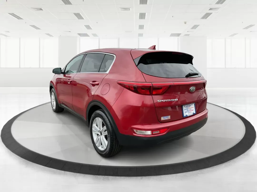 2018 Kia Sportage LX (KNDPM3AC2J7) with an Theta II 2.4L I-4 gasoline direct injection engine, located at 1099 N County Rd 25A , Troy, OH, 45373, (937) 908-9800, 40.057079, -84.212883 - Photo#4