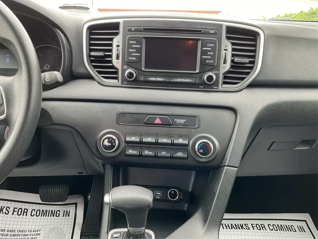 2018 Kia Sportage LX (KNDPM3AC2J7) with an Theta II 2.4L I-4 gasoline direct injection engine, located at 1099 N County Rd 25A , Troy, OH, 45373, (937) 908-9800, 40.057079, -84.212883 - Photo#11