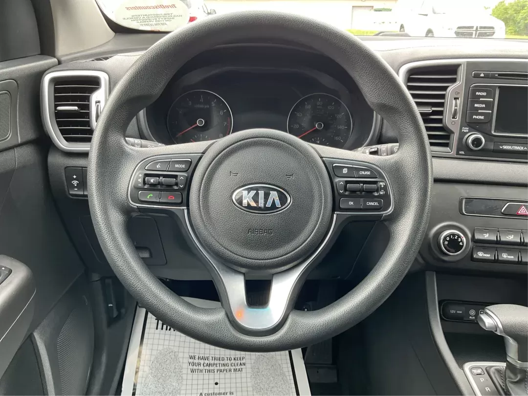 2018 Kia Sportage LX (KNDPM3AC2J7) with an Theta II 2.4L I-4 gasoline direct injection engine, located at 1099 N County Rd 25A , Troy, OH, 45373, (937) 908-9800, 40.057079, -84.212883 - Photo#14