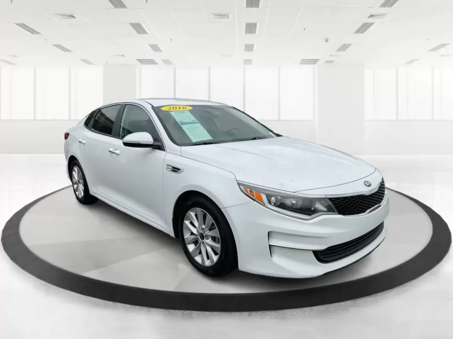 2016 Kia Optima LX (5XXGT4L32GG) with an Theta II 2.4L I-4 gasoline direct injection engine, located at 8750 N County Rd 25A, Piqua, OH, 45356, (937) 908-9800, 40.164391, -84.232513 - 2016 Kia Optima LX - Photo#0