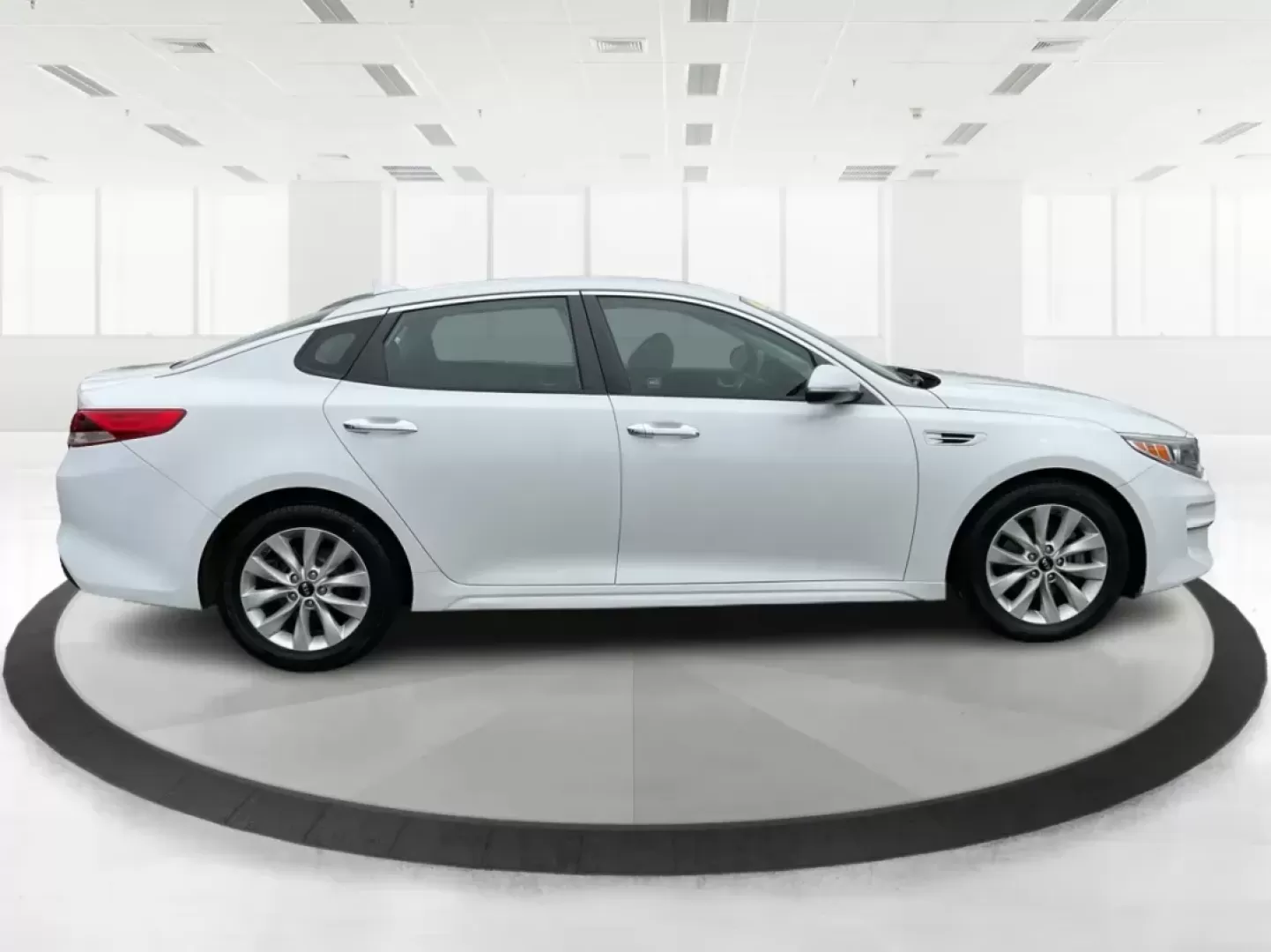 2016 Kia Optima LX (5XXGT4L32GG) with an Theta II 2.4L I-4 gasoline direct injection engine, located at 8750 N County Rd 25A, Piqua, OH, 45356, (937) 908-9800, 40.164391, -84.232513 - 2016 Kia Optima LX - Photo#1