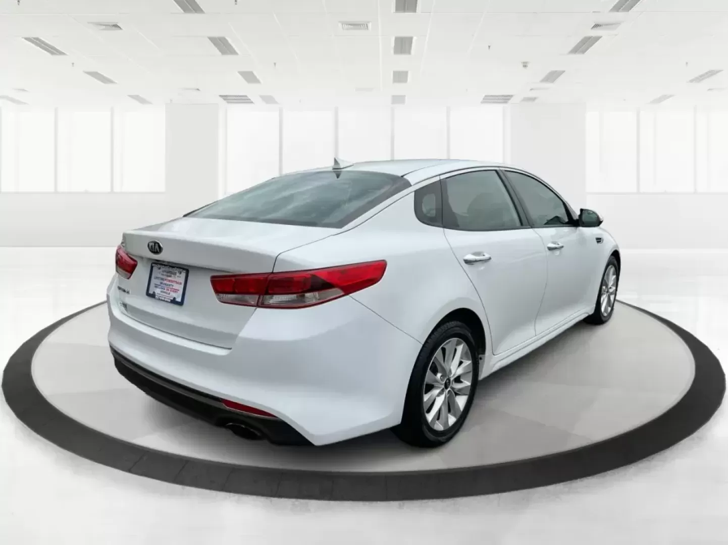 2016 Kia Optima LX (5XXGT4L32GG) with an Theta II 2.4L I-4 gasoline direct injection engine, located at 8750 N County Rd 25A, Piqua, OH, 45356, (937) 908-9800, 40.164391, -84.232513 - 2016 Kia Optima LX - Photo#2