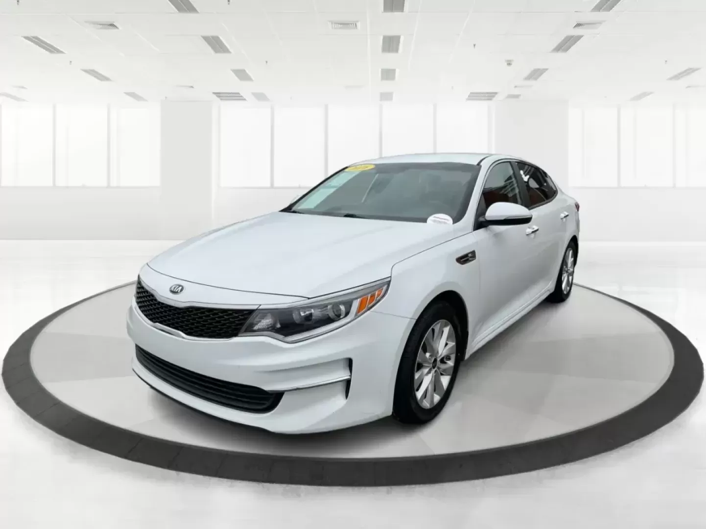 2016 Kia Optima LX (5XXGT4L32GG) with an Theta II 2.4L I-4 gasoline direct injection engine, located at 8750 N County Rd 25A, Piqua, OH, 45356, (937) 908-9800, 40.164391, -84.232513 - 2016 Kia Optima LX - Photo#7