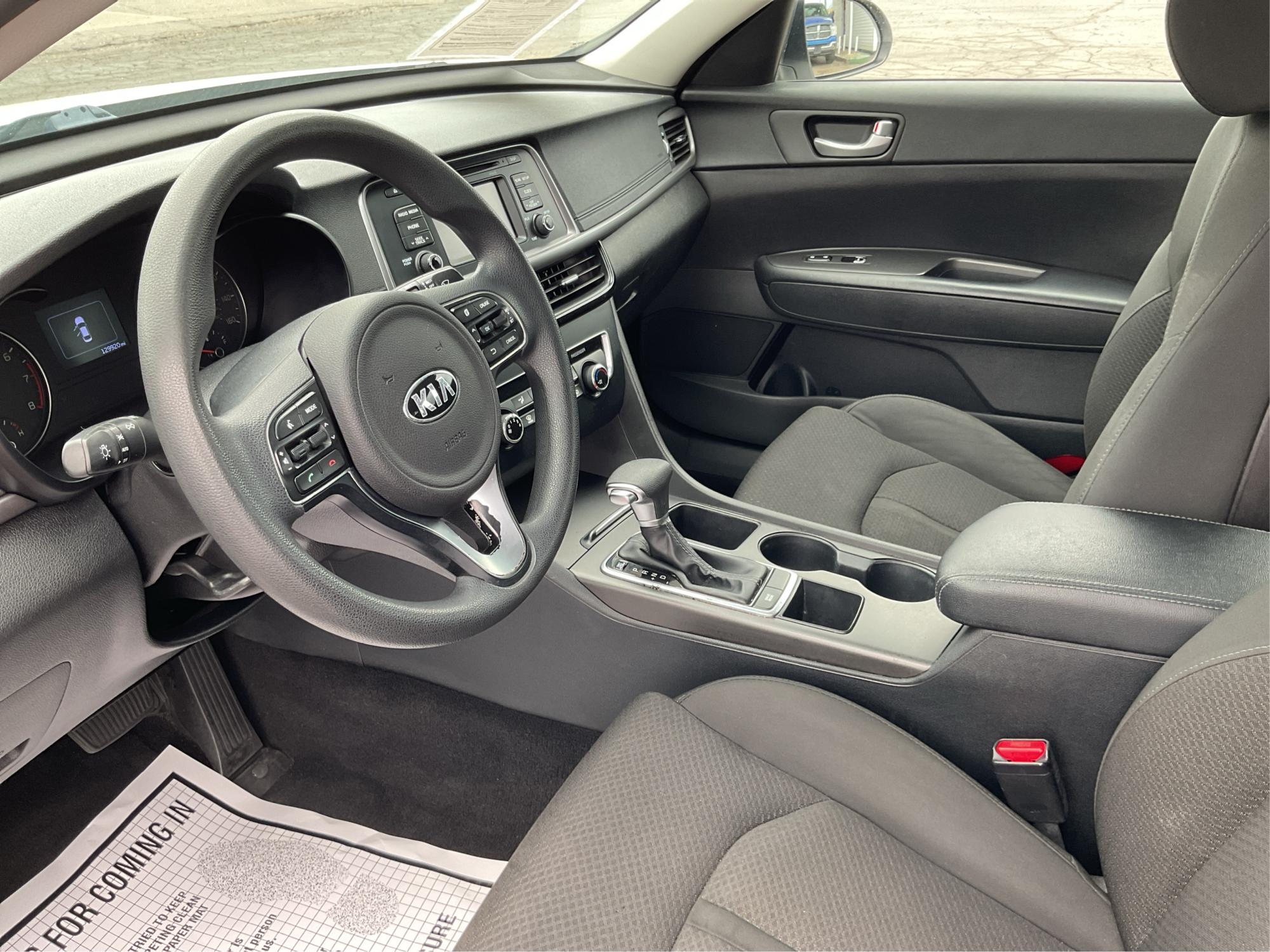 2016 Kia Optima LX (5XXGT4L32GG) with an Theta II 2.4L I-4 gasoline direct injection engine, located at 8750 N County Rd 25A, Piqua, OH, 45356, (937) 908-9800, 40.164391, -84.232513 - Photo#9