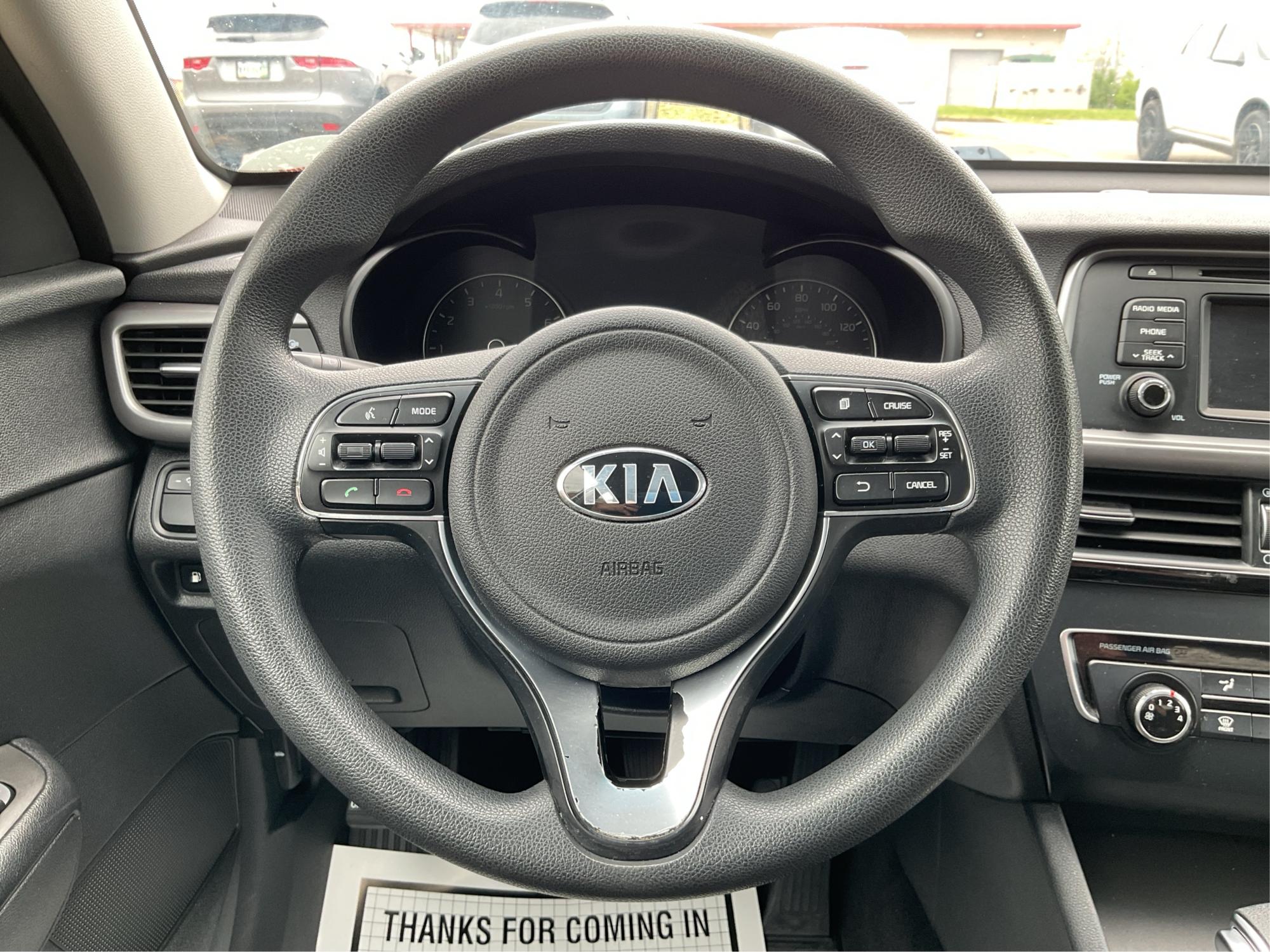 2016 Kia Optima LX (5XXGT4L32GG) with an Theta II 2.4L I-4 gasoline direct injection engine, located at 8750 N County Rd 25A, Piqua, OH, 45356, (937) 908-9800, 40.164391, -84.232513 - Photo#16