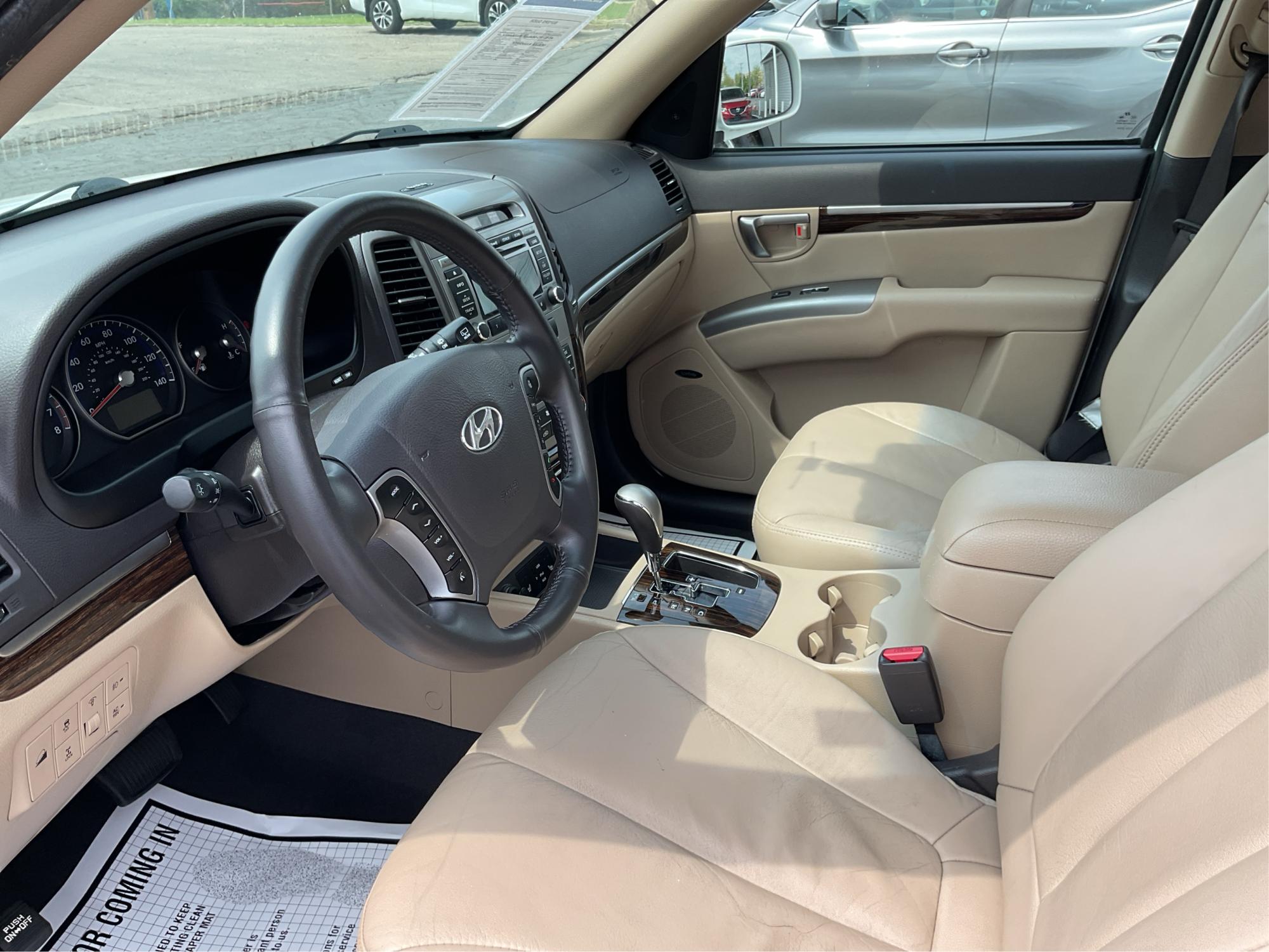 2012 Hyundai Santa Fe Limited V6 (5XYZKDAG5CG) with an 3.5L V-6 DOHC engine, located at 1230 East Main St, Xenia, OH, 45385, (937) 908-9800, 39.688026, -83.910172 - 2012 Hyundai Santa Fe Limited V6 - Photo#9