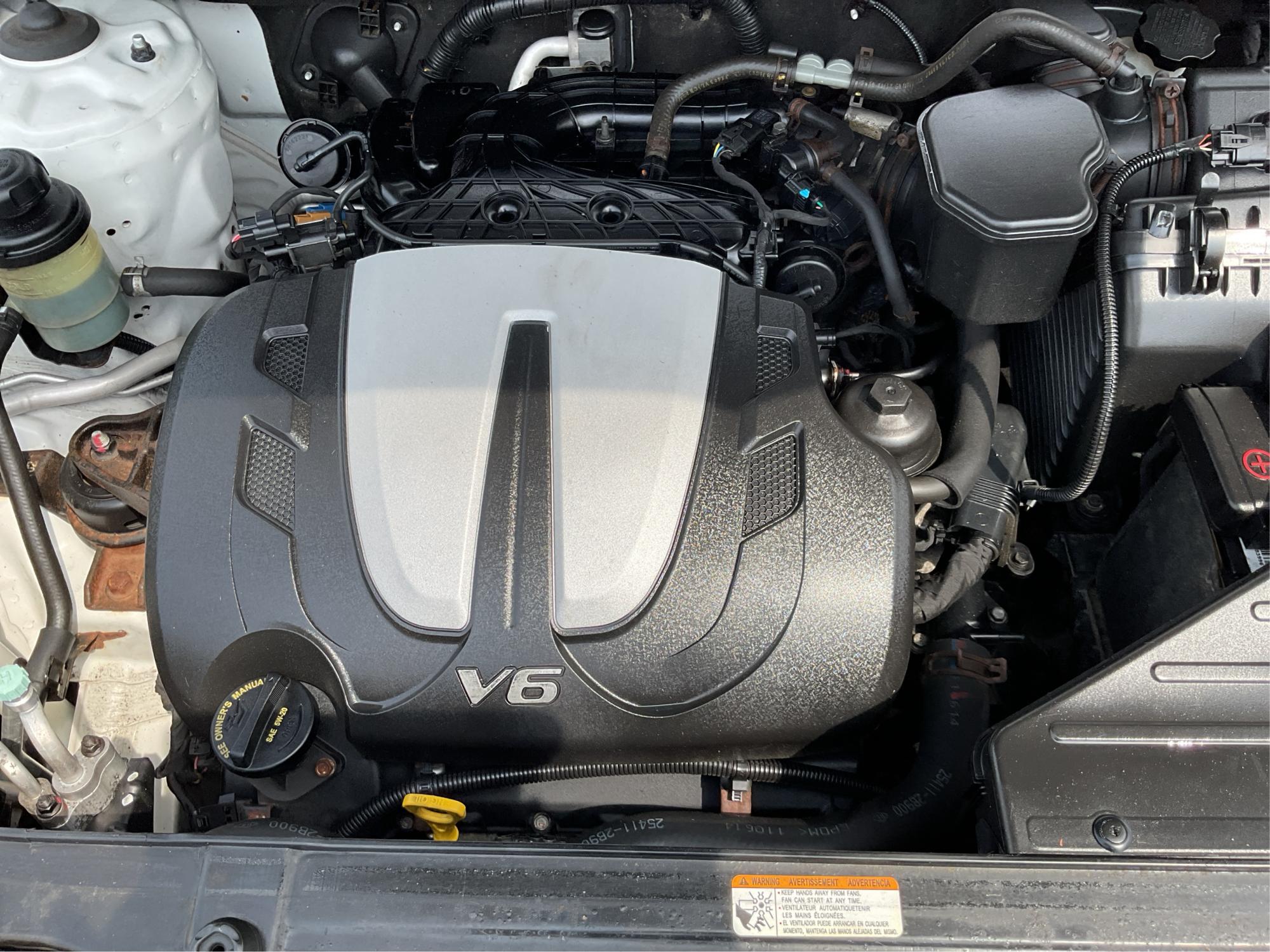 2012 Hyundai Santa Fe Limited V6 (5XYZKDAG5CG) with an 3.5L V-6 DOHC engine, located at 1230 East Main St, Xenia, OH, 45385, (937) 908-9800, 39.688026, -83.910172 - 2012 Hyundai Santa Fe Limited V6 - Photo#11