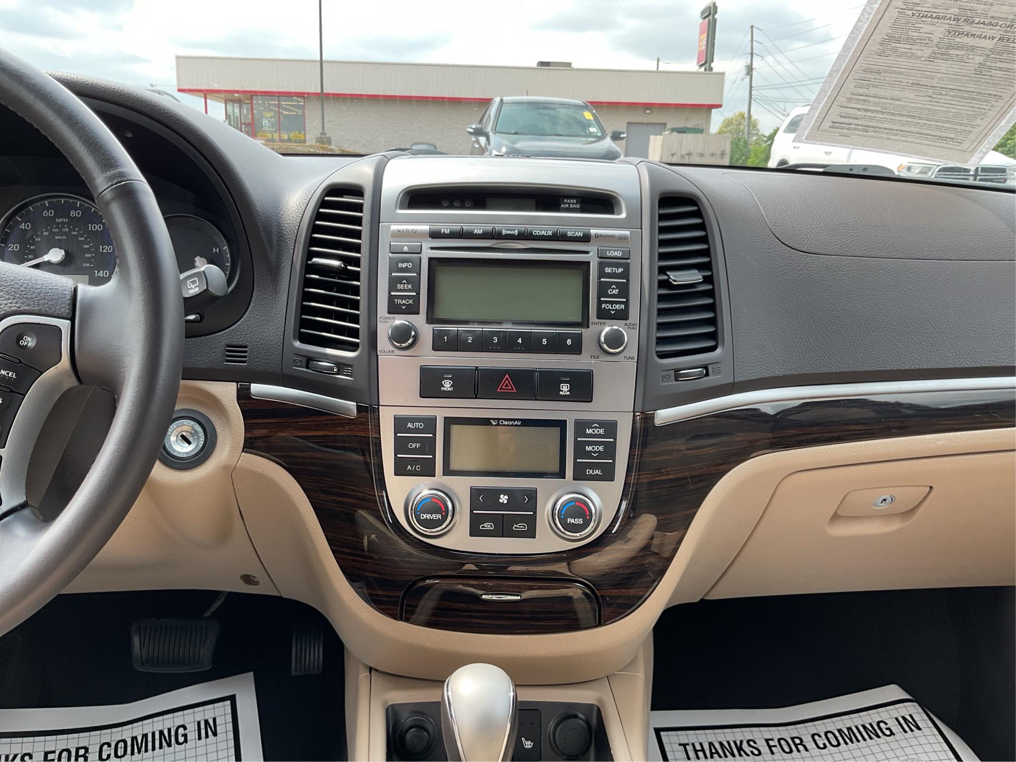 2012 Hyundai Santa Fe Limited V6 (5XYZKDAG5CG) with an 3.5L V-6 DOHC engine, located at 1230 East Main St, Xenia, OH, 45385, (937) 908-9800, 39.688026, -83.910172 - 2012 Hyundai Santa Fe Limited V6 - Photo#13