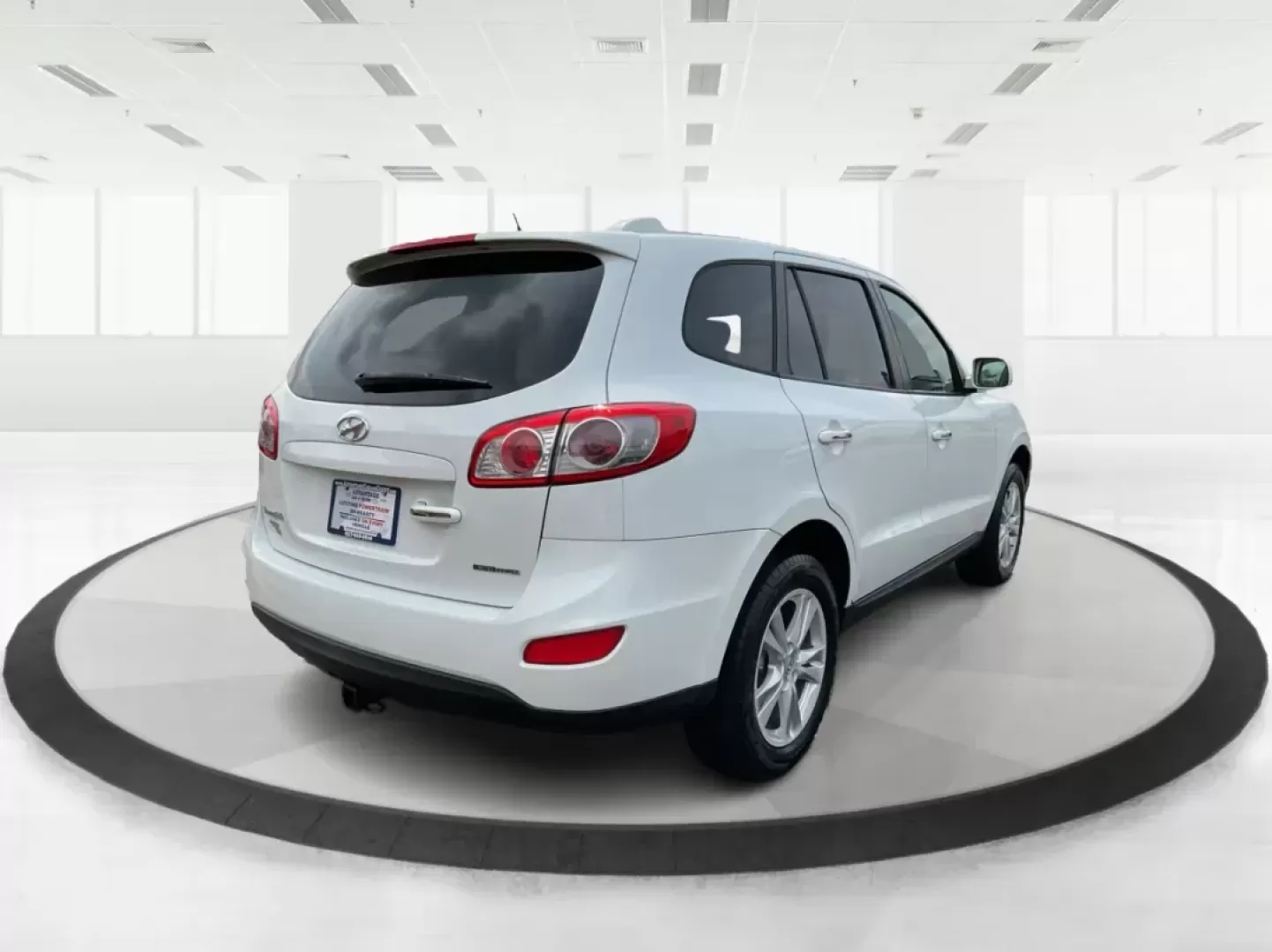 2012 Hyundai Santa Fe Limited V6 (5XYZKDAG5CG) with an 3.5L V-6 DOHC engine, located at 1230 East Main St, Xenia, OH, 45385, (937) 908-9800, 39.688026, -83.910172 - 2012 Hyundai Santa Fe Limited V6 - Photo#1