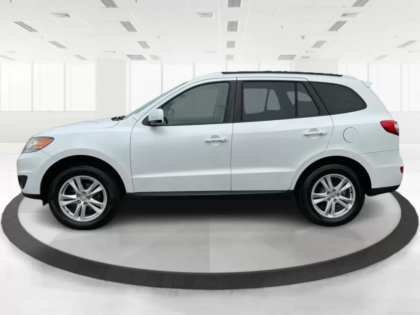2012 Hyundai Santa Fe Limited V6 (5XYZKDAG5CG) with an 3.5L V-6 DOHC engine, located at 1230 East Main St, Xenia, OH, 45385, (937) 908-9800, 39.688026, -83.910172 - 2012 Hyundai Santa Fe Limited V6 - Photo#5